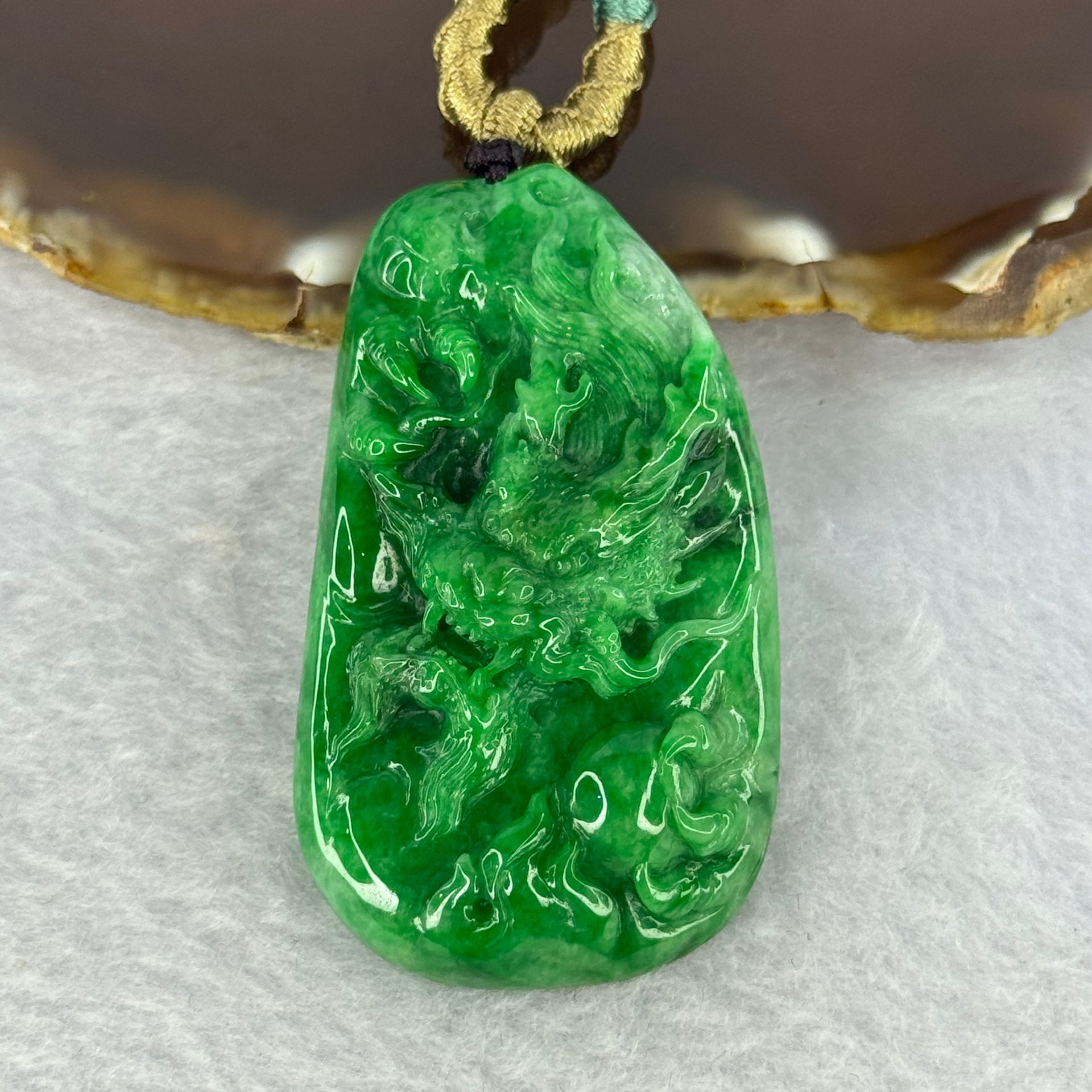 Grand Master Type A Spicy Green Jadeite Dragon 38.59g 54.6 by 31.6 by 11.3mm - Huangs Jadeite and Jewelry Pte Ltd