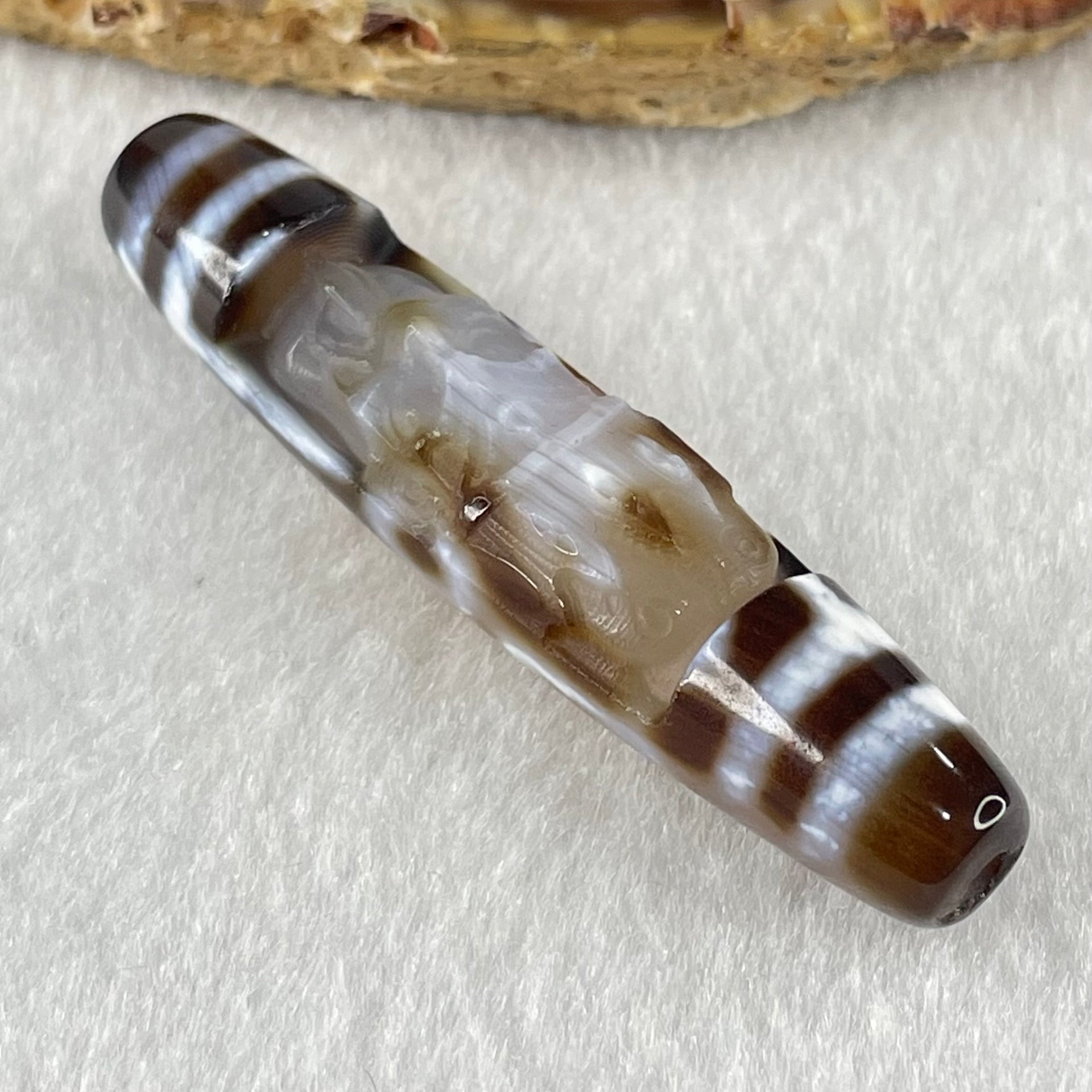 Natural Powerful Tibetan Old Oily Agate Zha Ji La Mu Female Cai Shen Carvings on 9 Eyes Dzi Bead Heavenly Master (Tian Zhu) 九眼扎基拉姆女财神天珠 14.46g 58.4 by 13.0mm - Huangs Jadeite and Jewelry Pte Ltd