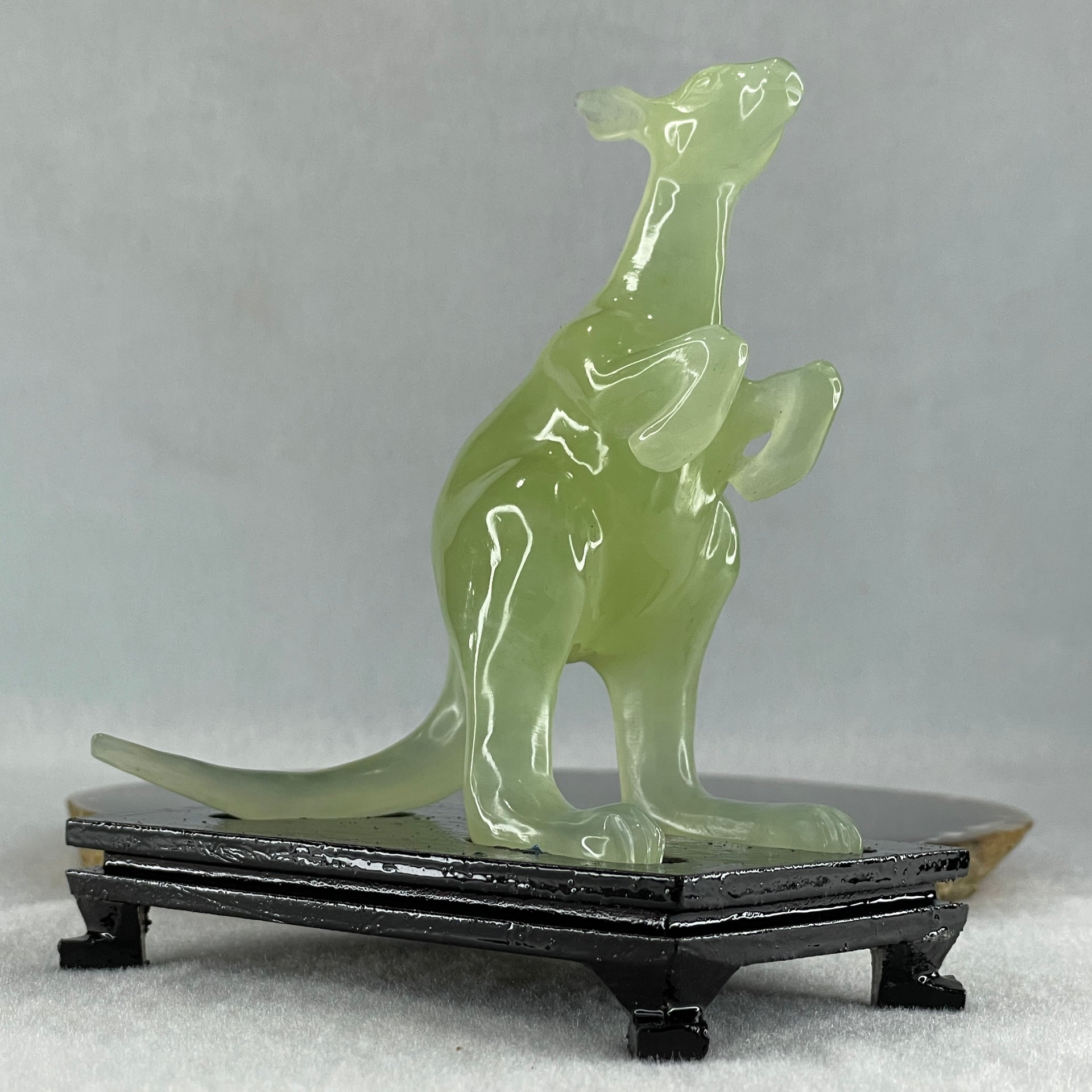 Natural Green Serpentine Kangaroo with Wooden Stand Display 172.6g 100.8 by 63.0 by 115.0mm - Huangs Jadeite and Jewelry Pte Ltd