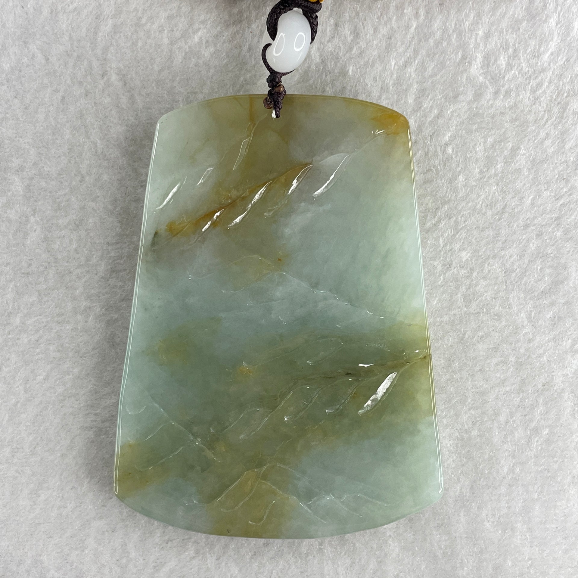 Natural Type A Sky Blue with Yellowish Green Jadeite Shan Shui with Gui Ren Benefactor Pendant 94.26g 75.5 by 55.5 by 10.5mm - Huangs Jadeite and Jewelry Pte Ltd