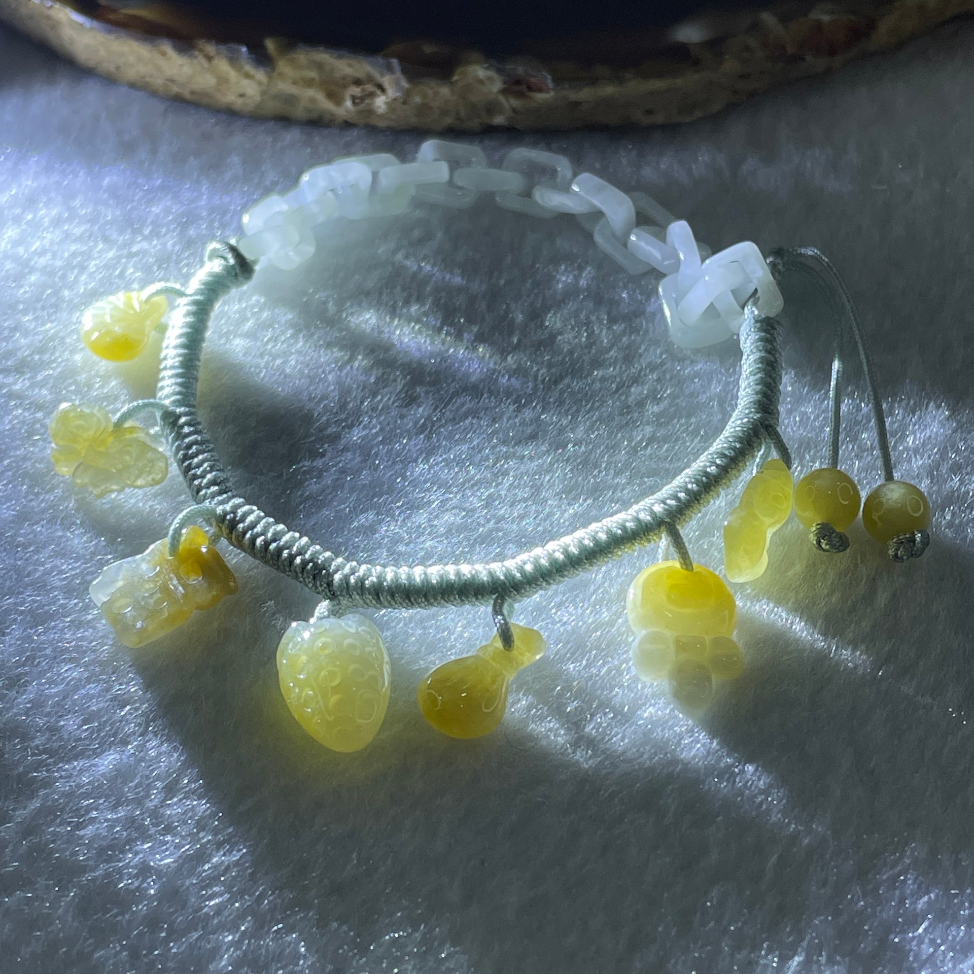 Natural Type A Yellowish Jadeite Money Bag Hulu Fu Butterfly in String Bracelet 8.79g 16-20cm 12.7 by 8.8 by 6.9mm - Huangs Jadeite and Jewelry Pte Ltd