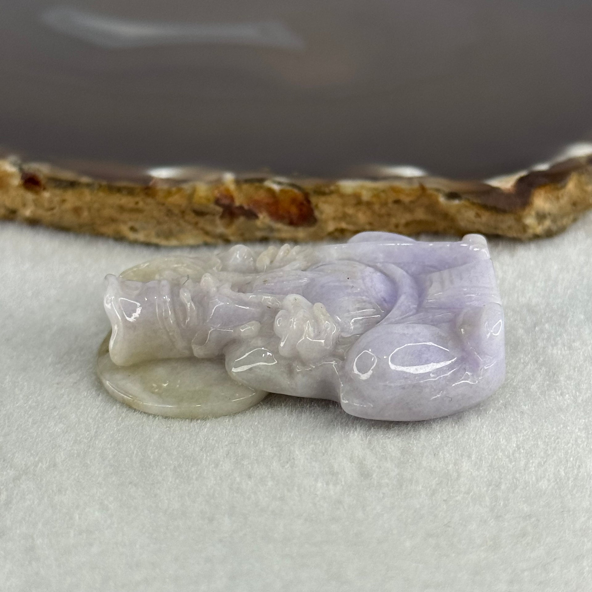 Type A Lavender with Slight Green Jadeite Tu Di Gong 38.27g 48.0 by 39.3 by 11.9mm - Huangs Jadeite and Jewelry Pte Ltd
