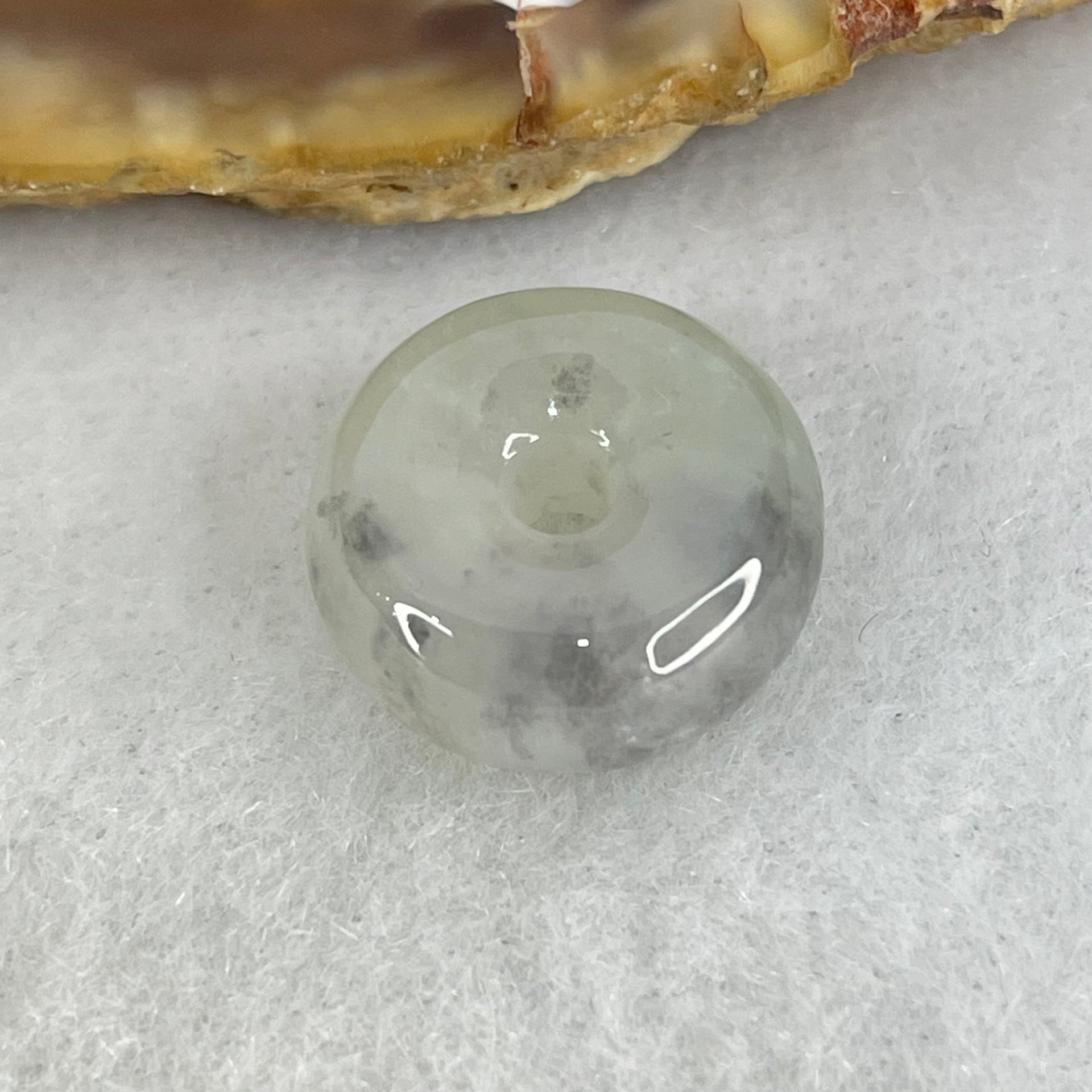 Type A Semi Icy Light Green With Wuji Grey Spots Jadeite Ping An Kou Donut Pendant 2.37g 13.6 by 6.1mm - Huangs Jadeite and Jewelry Pte Ltd