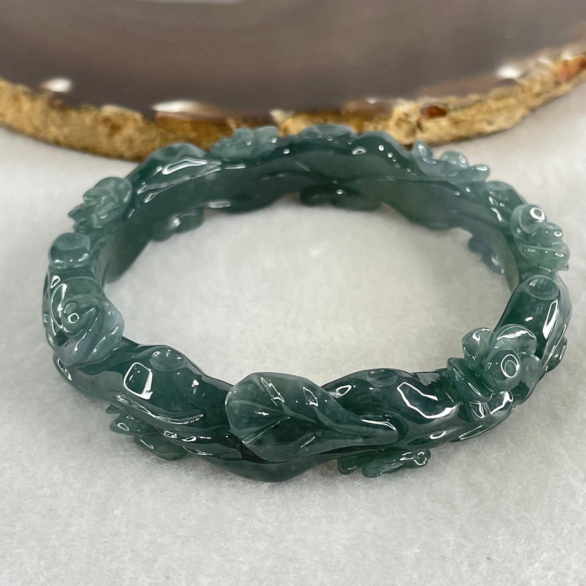 Type A Blueish Green Jadeite with Flowers Bangle 45.62g Inner Diameter 57.2mm 13.8 by 8.0mm - Huangs Jadeite and Jewelry Pte Ltd