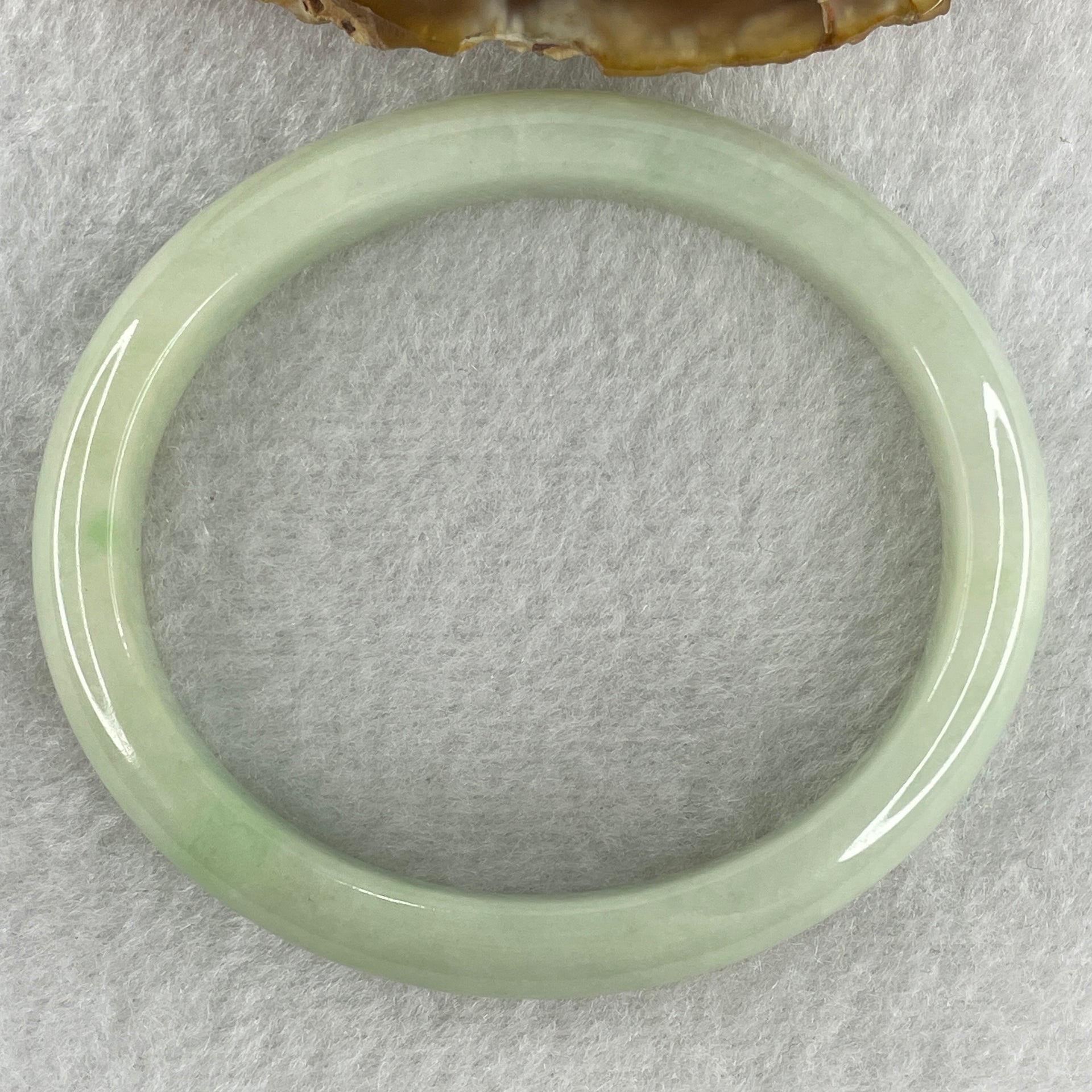 Natural Type A Light Apple Green Jadeite Oval Bangle 32.89g Inner Diameter 55.1mm Thickness 9.9 by 6.8mm (Close to Perfect) - Huangs Jadeite and Jewelry Pte Ltd