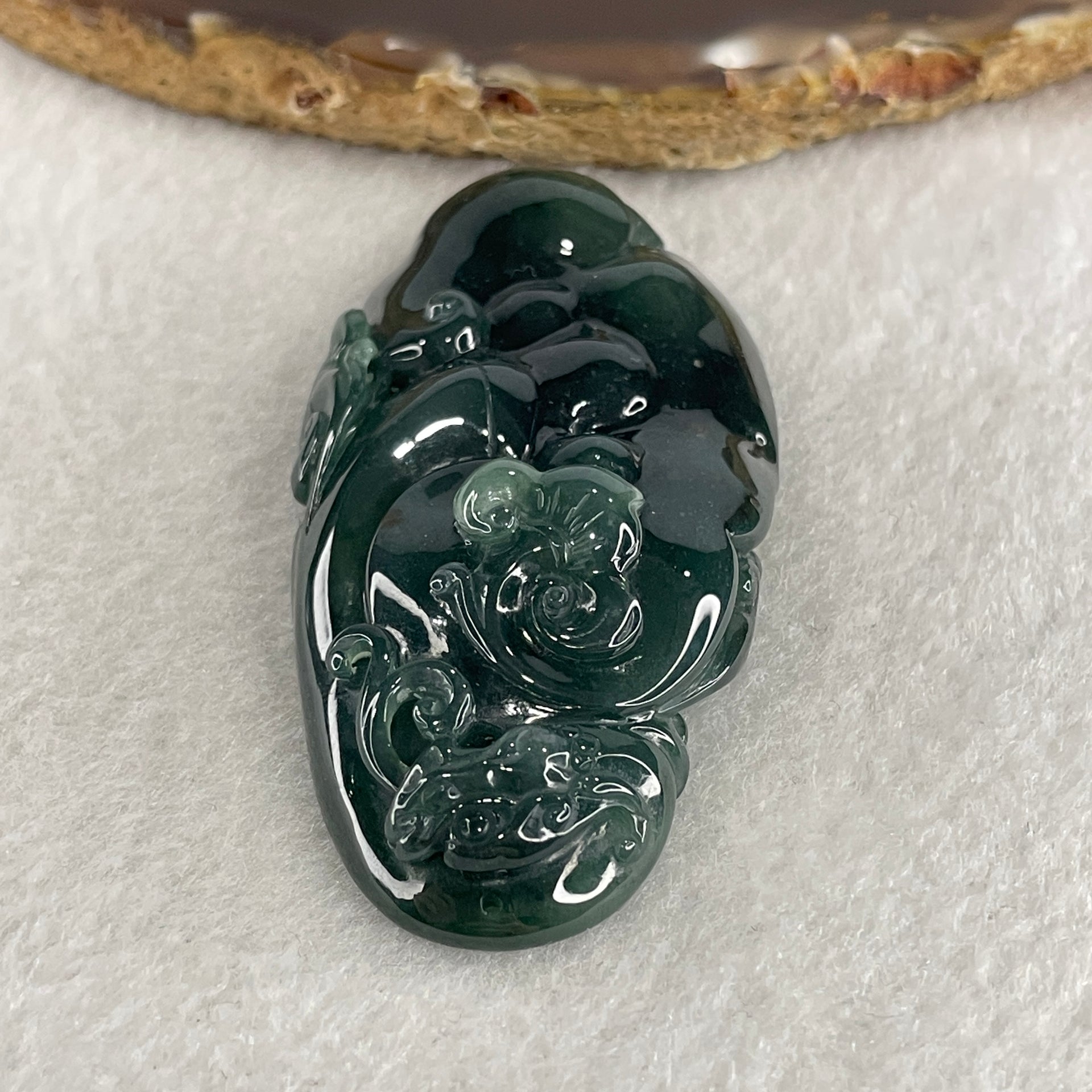 Certified Natural Type A Semi icy Blueish Green Jadeite Ruyi Double Side with Dragon Head Pendant 45.00g 69.8 by 34.0 by 13.9mm - Huangs Jadeite and Jewelry Pte Ltd