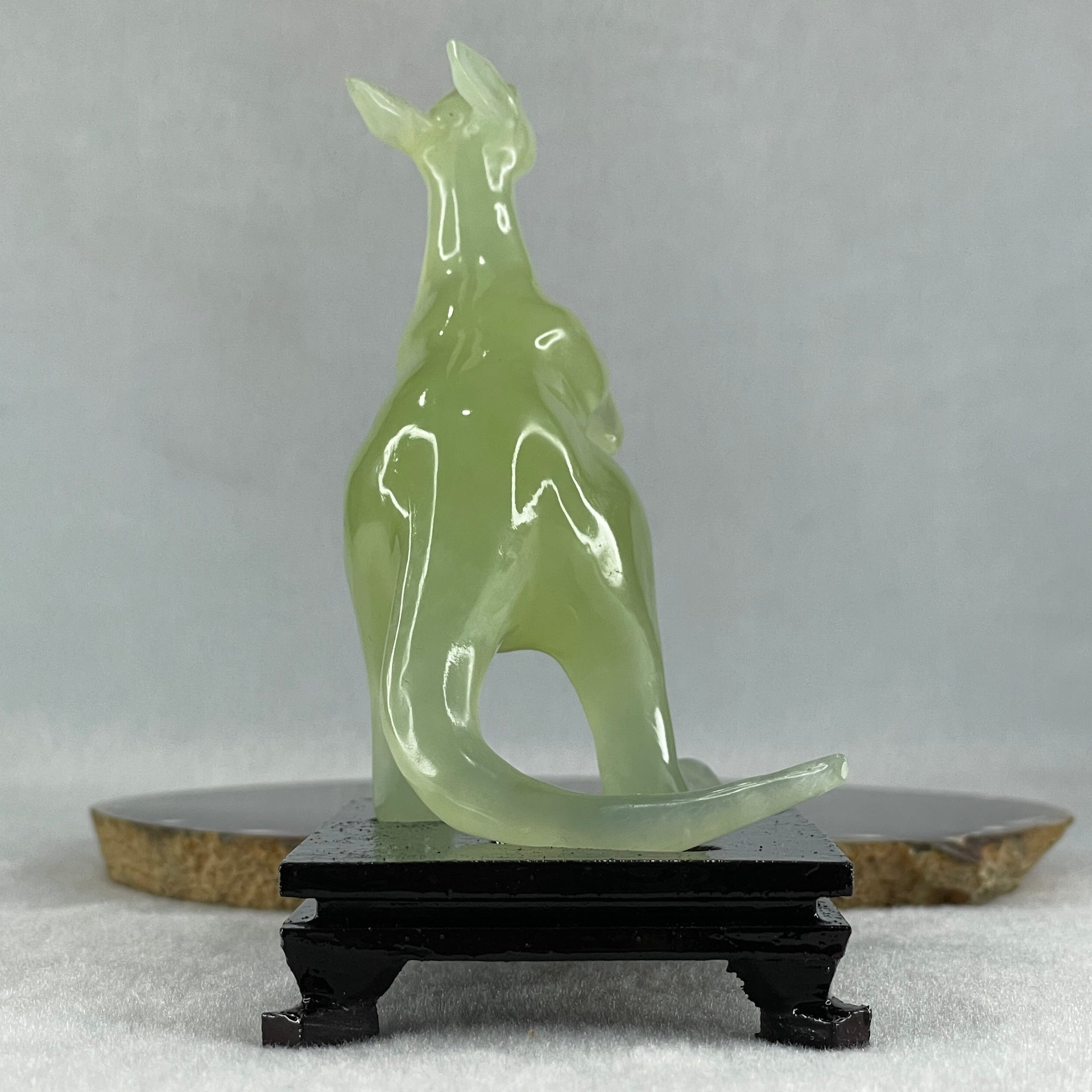 Natural Green Serpentine Kangaroo with Wooden Stand Display 172.6g 100.8 by 63.0 by 115.0mm - Huangs Jadeite and Jewelry Pte Ltd