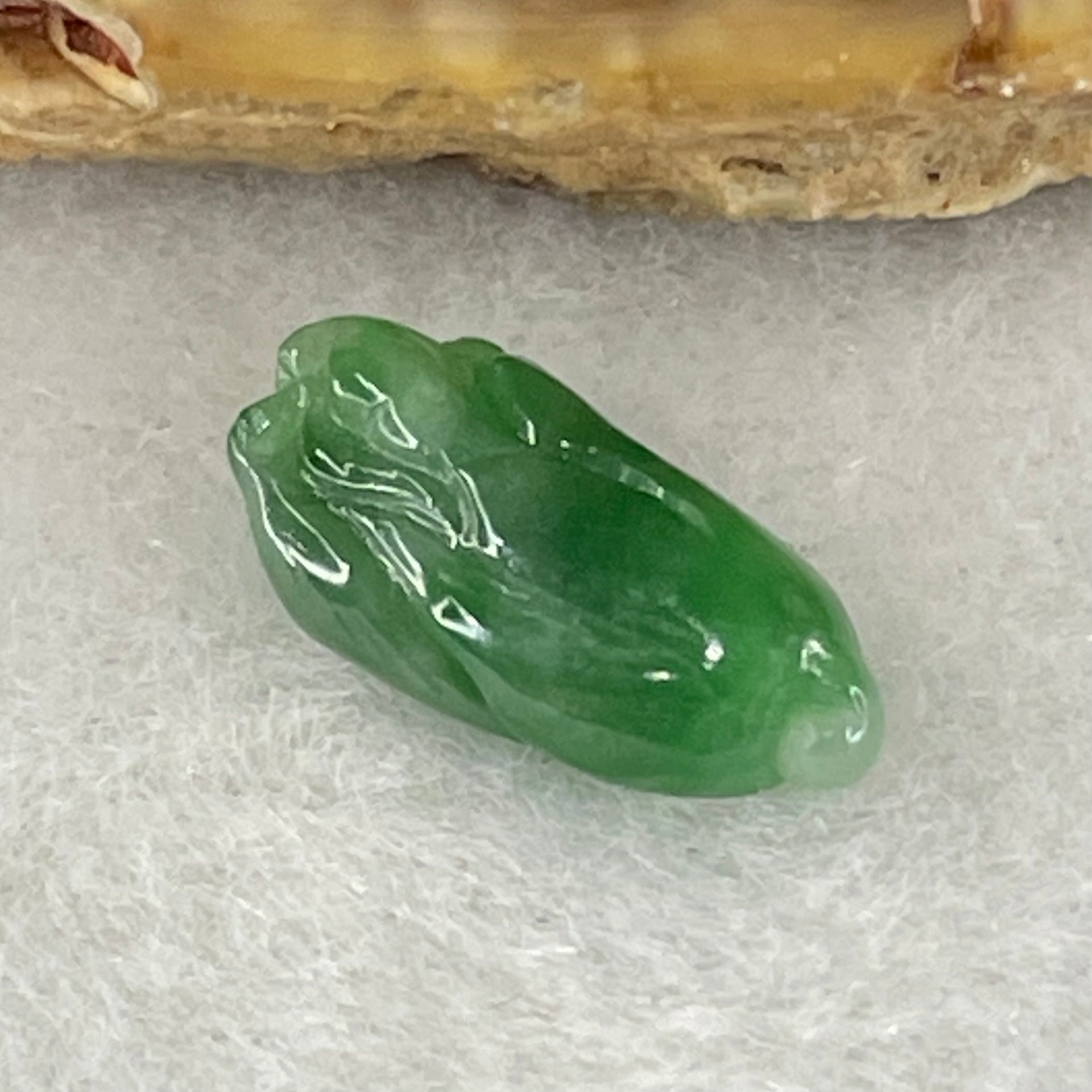 Type A Old Mine Spicy Green Jadeite Cabbage Charm Stone For Setting 0.63g 14.1 by 6.9 by 3.7mm - Huangs Jadeite and Jewelry Pte Ltd