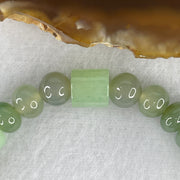 Natural Type A Muti Green Jadeite Donut with Lulutong Charm Bracelet 18.94g 15cm 7.6mm 33 Beads - 8.2 by 8.4mm Lulutong - Huangs Jadeite and Jewelry Pte Ltd