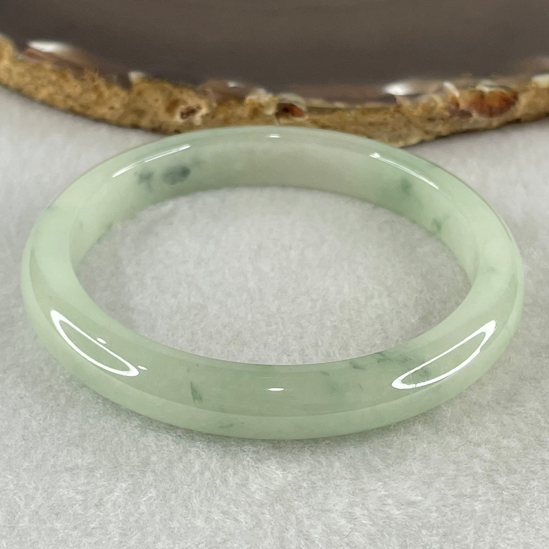 Type A Jelly Light Green with Blueish Green Piao Hua Floral Jadeite Bangle 38.24g Inner Diameter 55.8mm 9.4 by 7.2mm (Slight Internal Lines) - Huangs Jadeite and Jewelry Pte Ltd