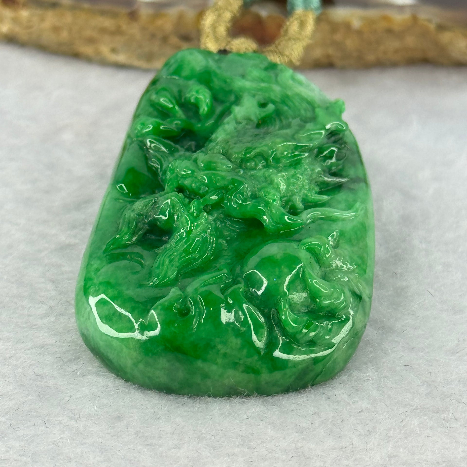 Grand Master Type A Spicy Green Jadeite Dragon 38.59g 54.6 by 31.6 by 11.3mm - Huangs Jadeite and Jewelry Pte Ltd