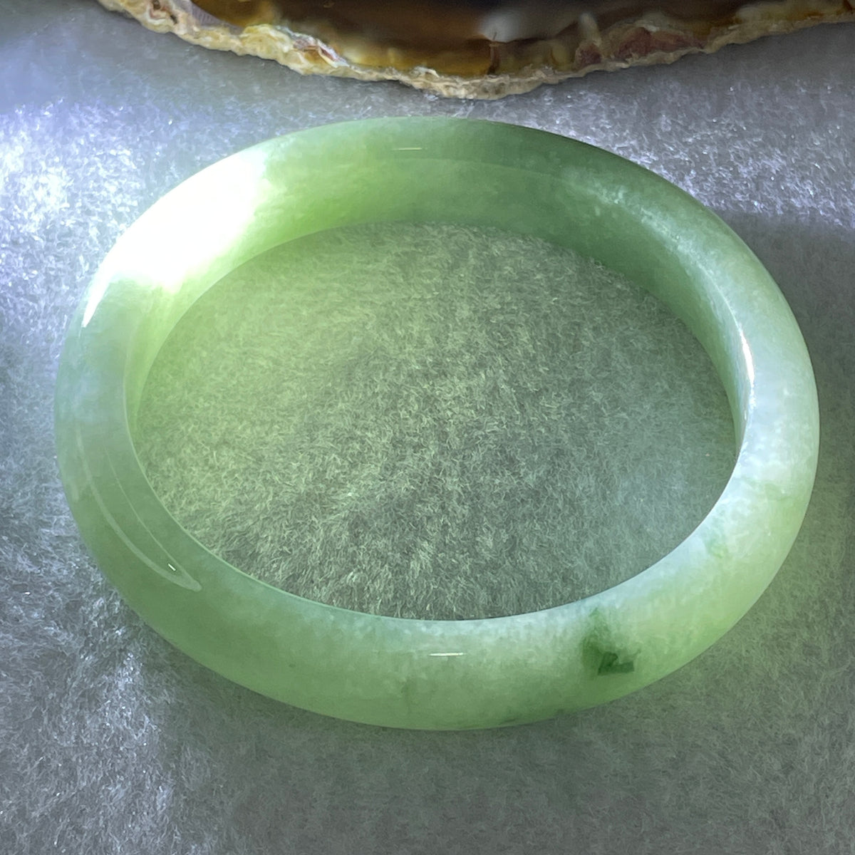 Certified Natural Type A Jelly Green Jadeite Oval Bangle | (43.99g | 55.1mm Inner Diameter | 12.5mm x 7.0mm | Close to Perfect | Radiance, Steady Wealth "Zheng Cai" Anchor & Feng Shui Prosperity Catalyst) - Huangs Jadeite and Jewelry Pte Ltd