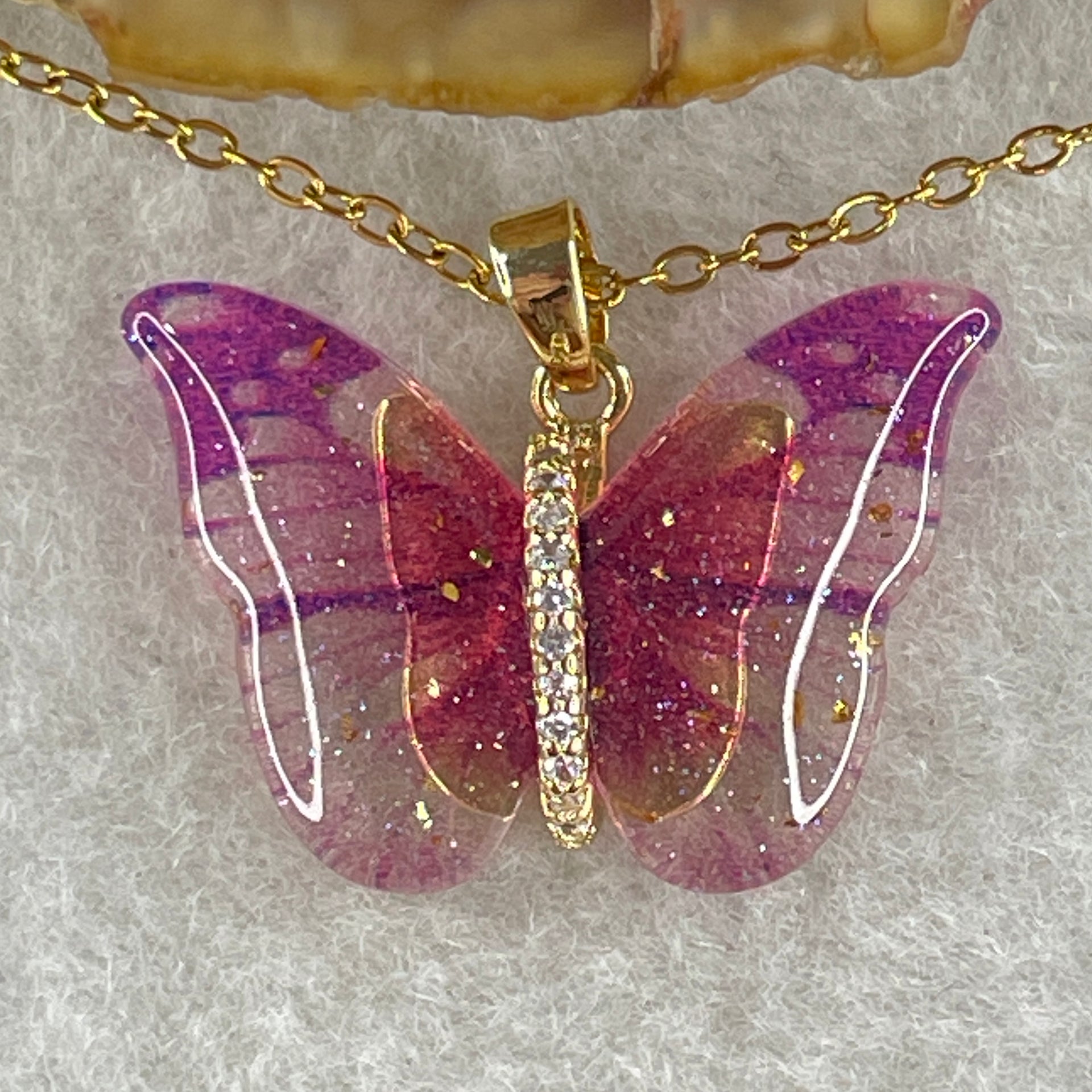 Man Made Pink Butterfly Pendant with Gold Color Necklace 3.39g 25.4 by 17.6 by 4.2mm - Huangs Jadeite and Jewelry Pte Ltd