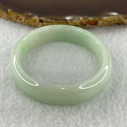 Natural Type A Light Green Jadeite Oval Bangle 36.17g Inner Diameter 54.6mm 12.5 by 6.4mm (Internal Lines) - Huangs Jadeite and Jewelry Pte Ltd