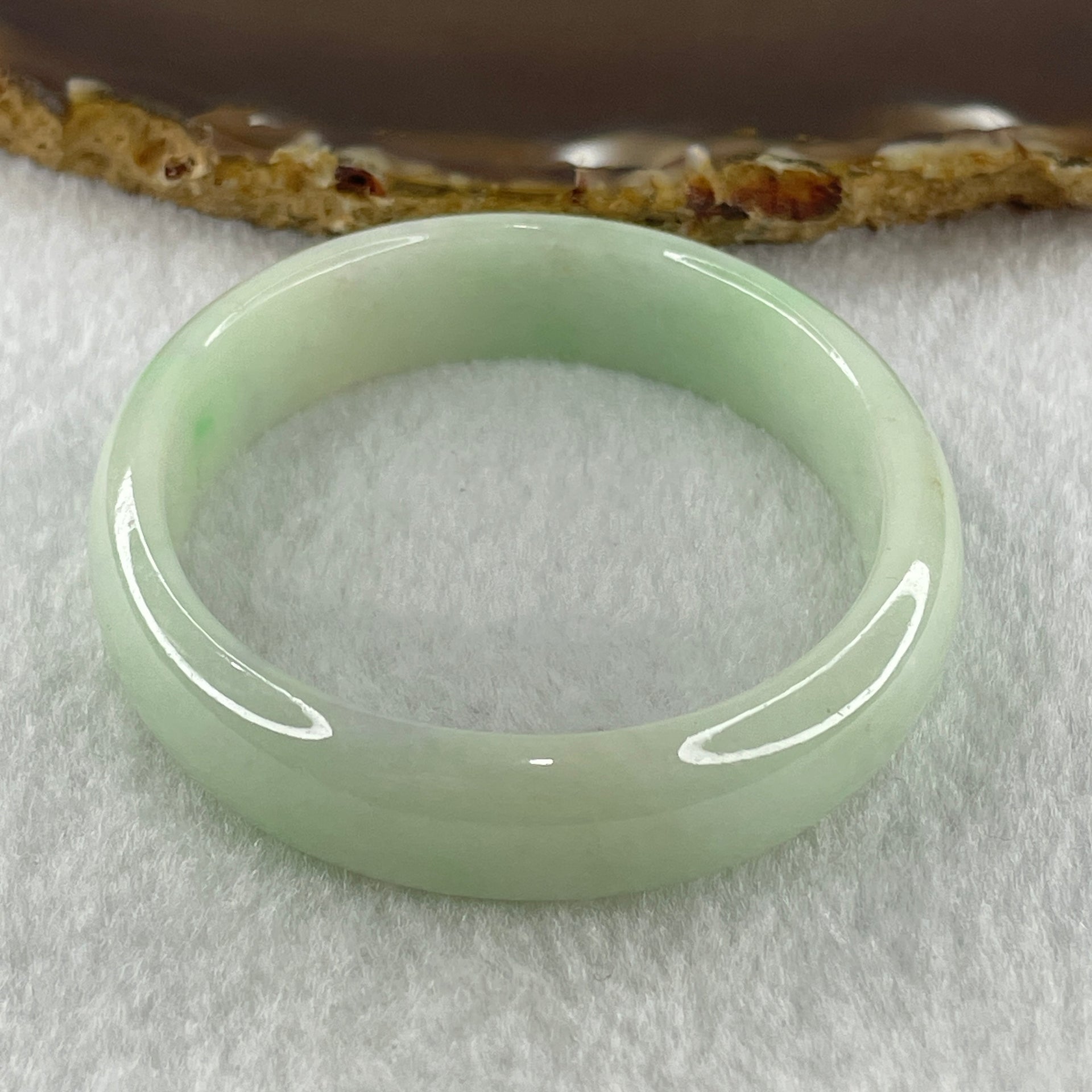 Natural Type A Light Green Jadeite Oval Bangle 36.17g Inner Diameter 54.6mm 12.5 by 6.4mm (Internal Lines) - Huangs Jadeite and Jewelry Pte Ltd