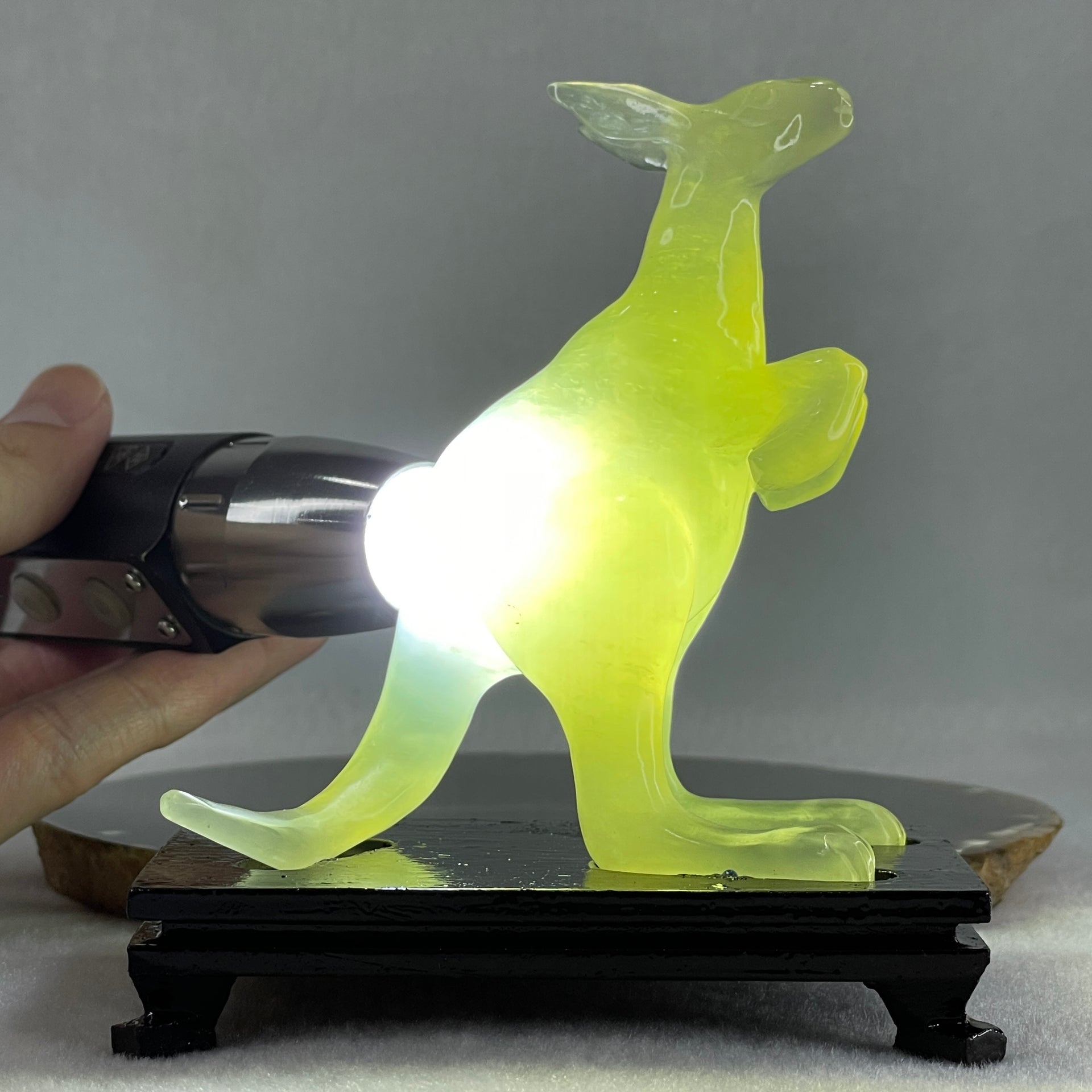 Natural Green Serpentine Kangaroo with Wooden Stand Display 172.6g 100.8 by 63.0 by 115.0mm - Huangs Jadeite and Jewelry Pte Ltd