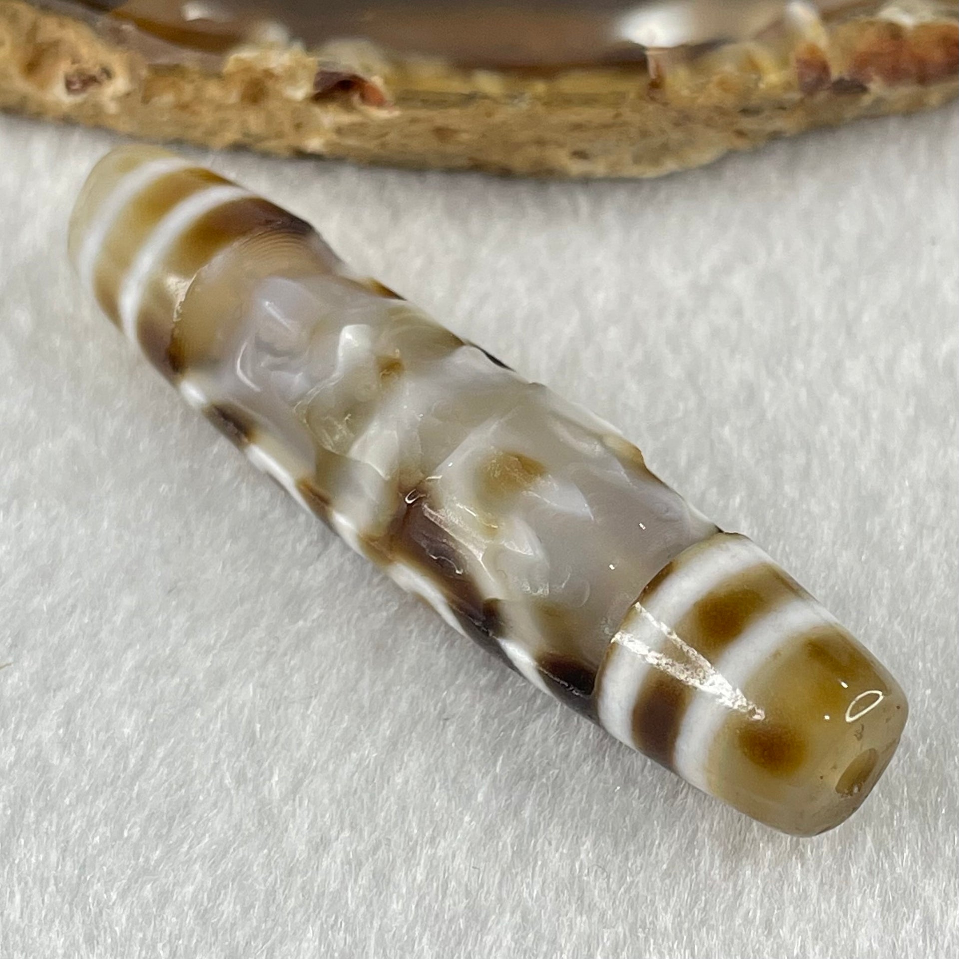 Natural Powerful Tibetan Old Oily Agate Zha Ji La Mu Female Cai Shen and 8 Eyes Dzi Bead Heavenly Master (Tian Zhu) 扎基拉姆女财神八眼天珠 13.65g 57.3 by 12.5mm - Huangs Jadeite and Jewelry Pte Ltd
