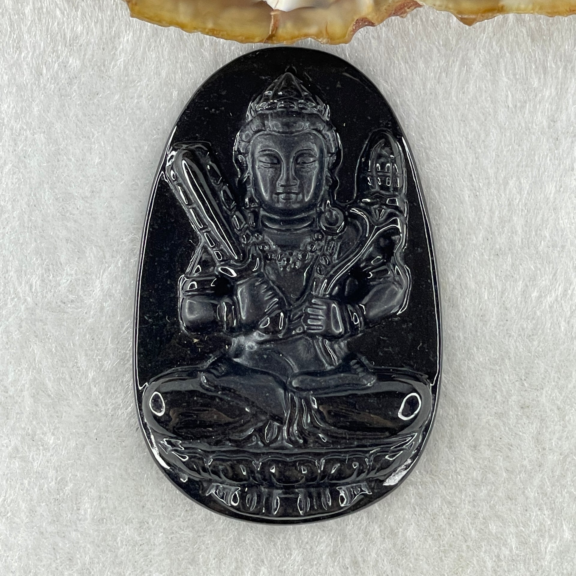 Type A Opaque to Partial Translucent Black Omphacite Jadeite Akasagarbha Bodhissattva Pendant Ox and Tiger Zodiac Guardian 17.04g 52.7 by 34.2 by 7.4mm - Huangs Jadeite and Jewelry Pte Ltd