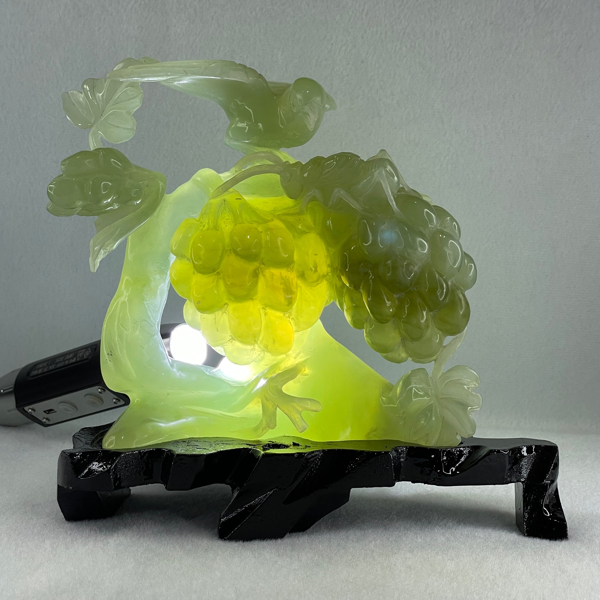 Natural Green Serpentine Magpie Bird with Cricket on Grape with Wooden Stand Display 1,042.7g L195.0 by B105.0 by H180.0 mm - Huangs Jadeite and Jewelry Pte Ltd