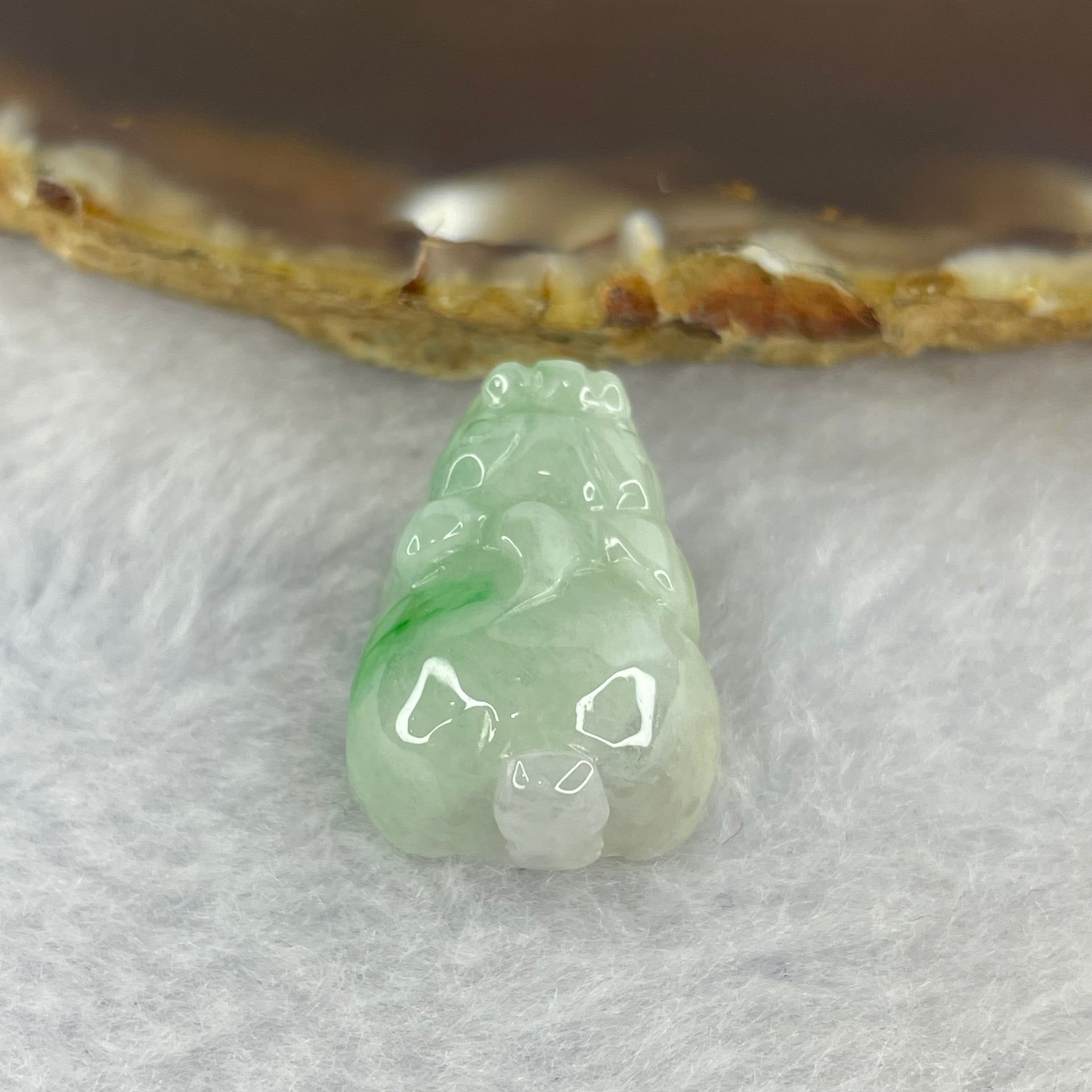 Type A Bright Green with Faint Lavender Jadeite Pixiu Pendent A货辣绿和浅紫罗兰翡翠貔貅吊坠 8.32g 22.8 by 16.2 by 12.0 mm - Huangs Jadeite and Jewelry Pte Ltd