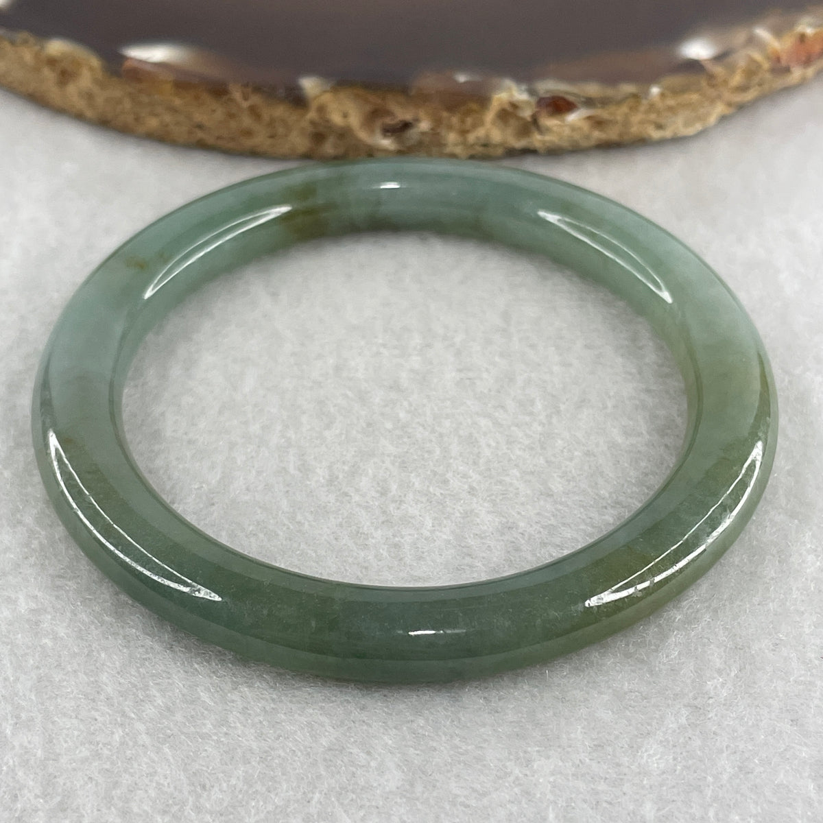 Natural Type A Blueish Green Piao Hua Jadeite Flat Ding Dang Bangle 27.60g Inner Diameter 51.3mm 7.0 by 7.9mm (Very Slight External Line) - Huangs Jadeite and Jewelry Pte Ltd
