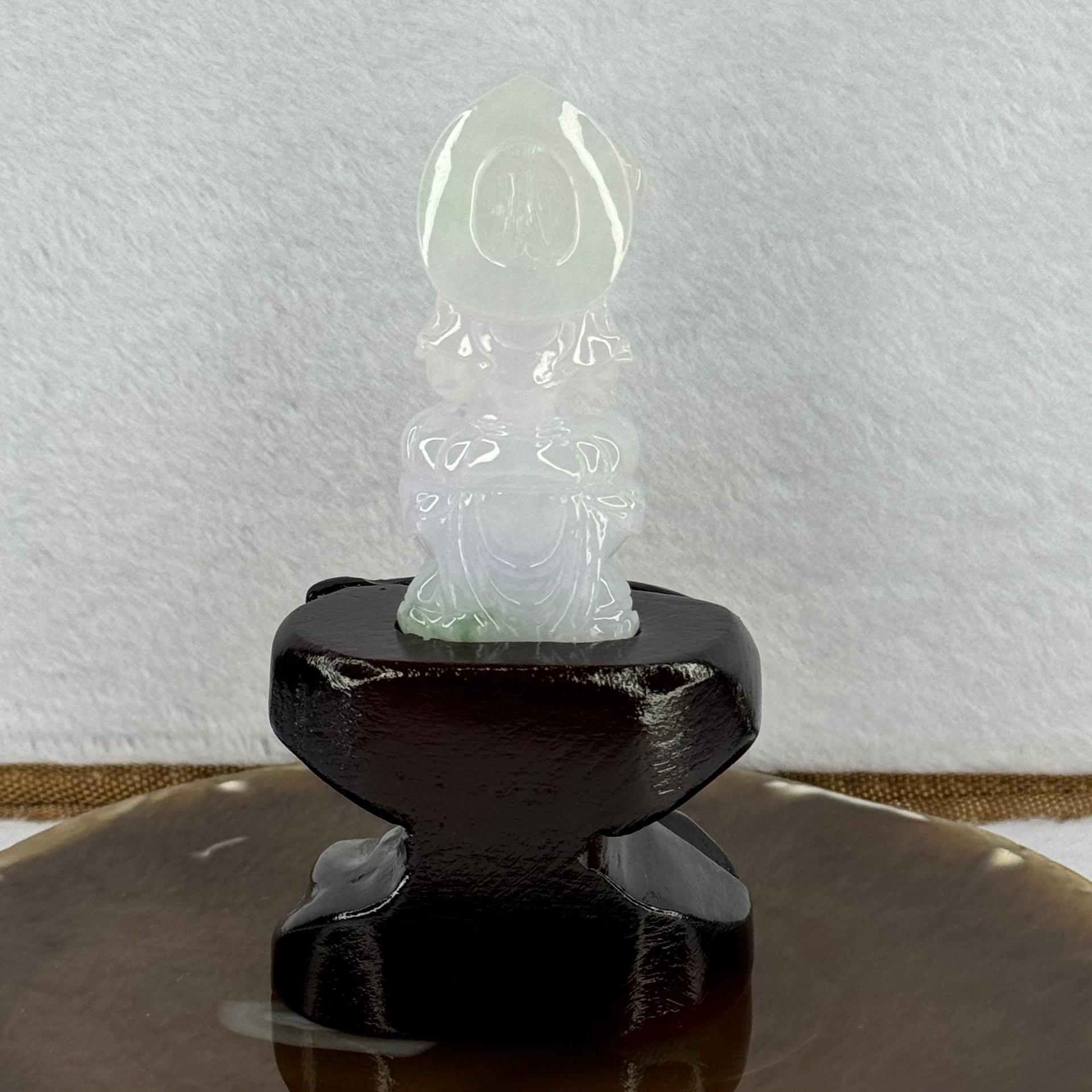Type A Light Lavender with Green Patches Jadeite Guan Yin Pendent with Wooden Stand 111.55g  111.8 by 58.7 by 46.6mm - Huangs Jadeite and Jewelry Pte Ltd