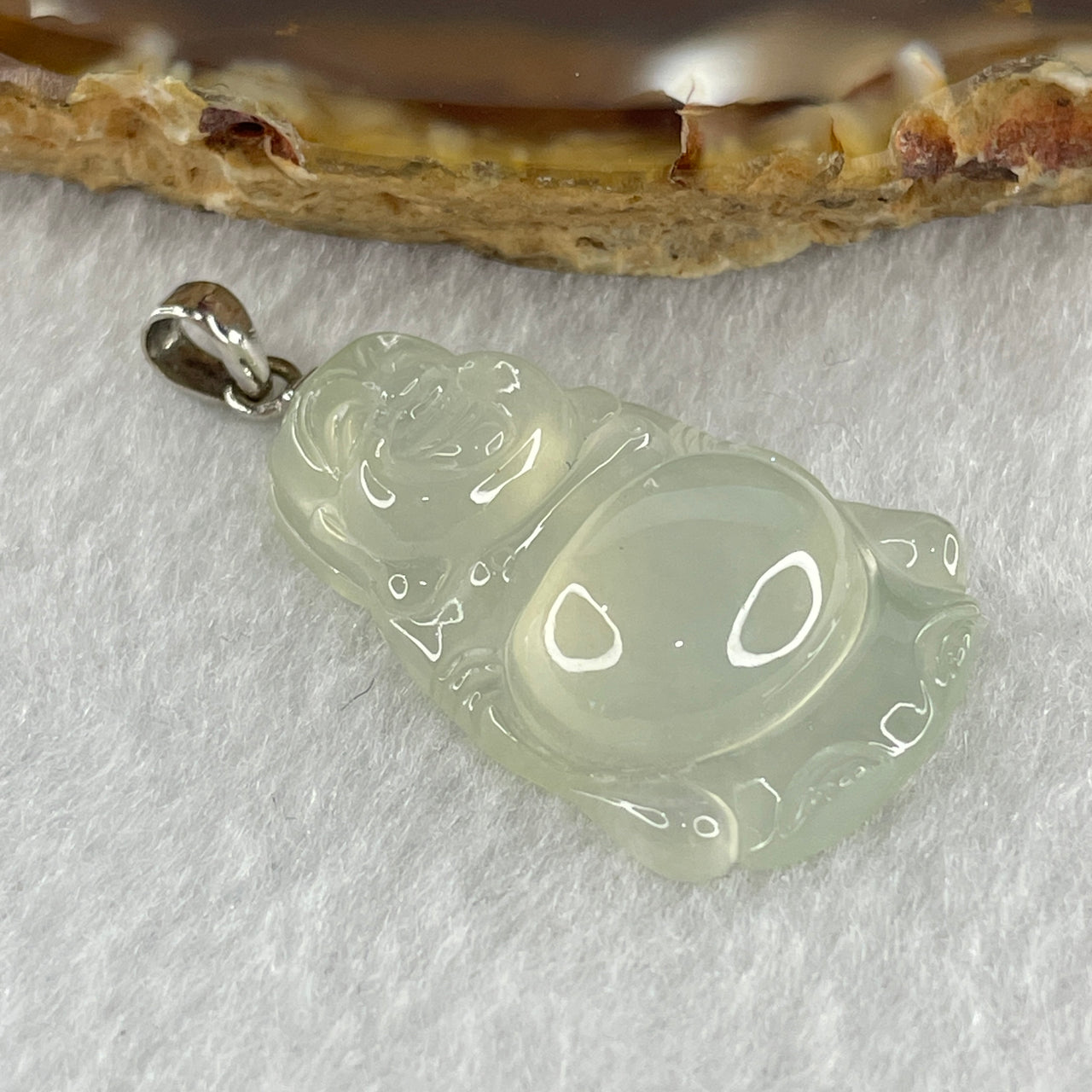 High Grade Natural Type A High Icy Near Colorless Jadeite Milo Buddha in 18K White Gold Clasp 5.39g 29.0 by 19.1 by 6.7mm