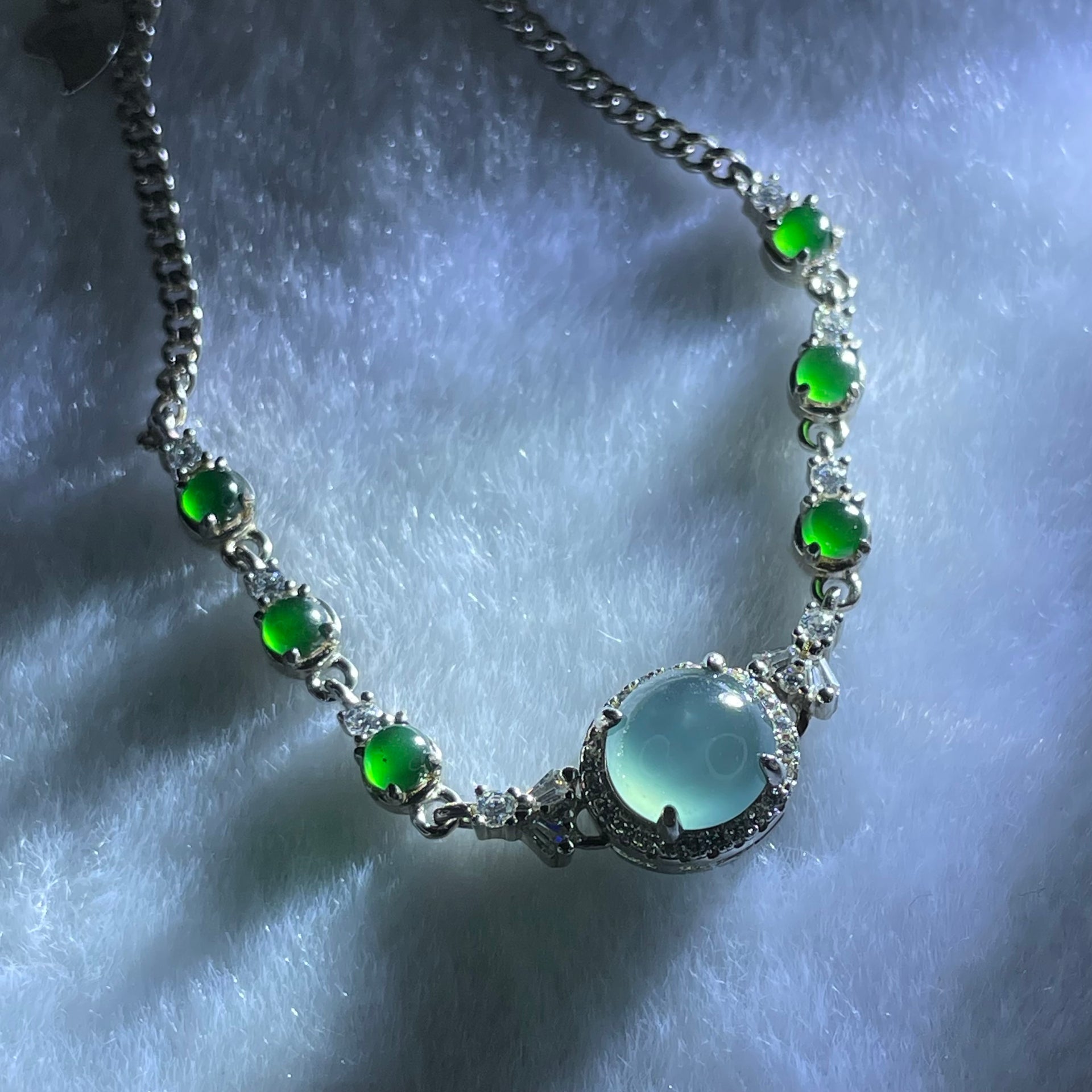 Type A Icy Blueish Green 7.2 by 5.0mm and Icy Green Omphasite Jadeite Cabochon With Crystals in S925 Sliver Bracelet 4.70g - Huangs Jadeite and Jewelry Pte Ltd