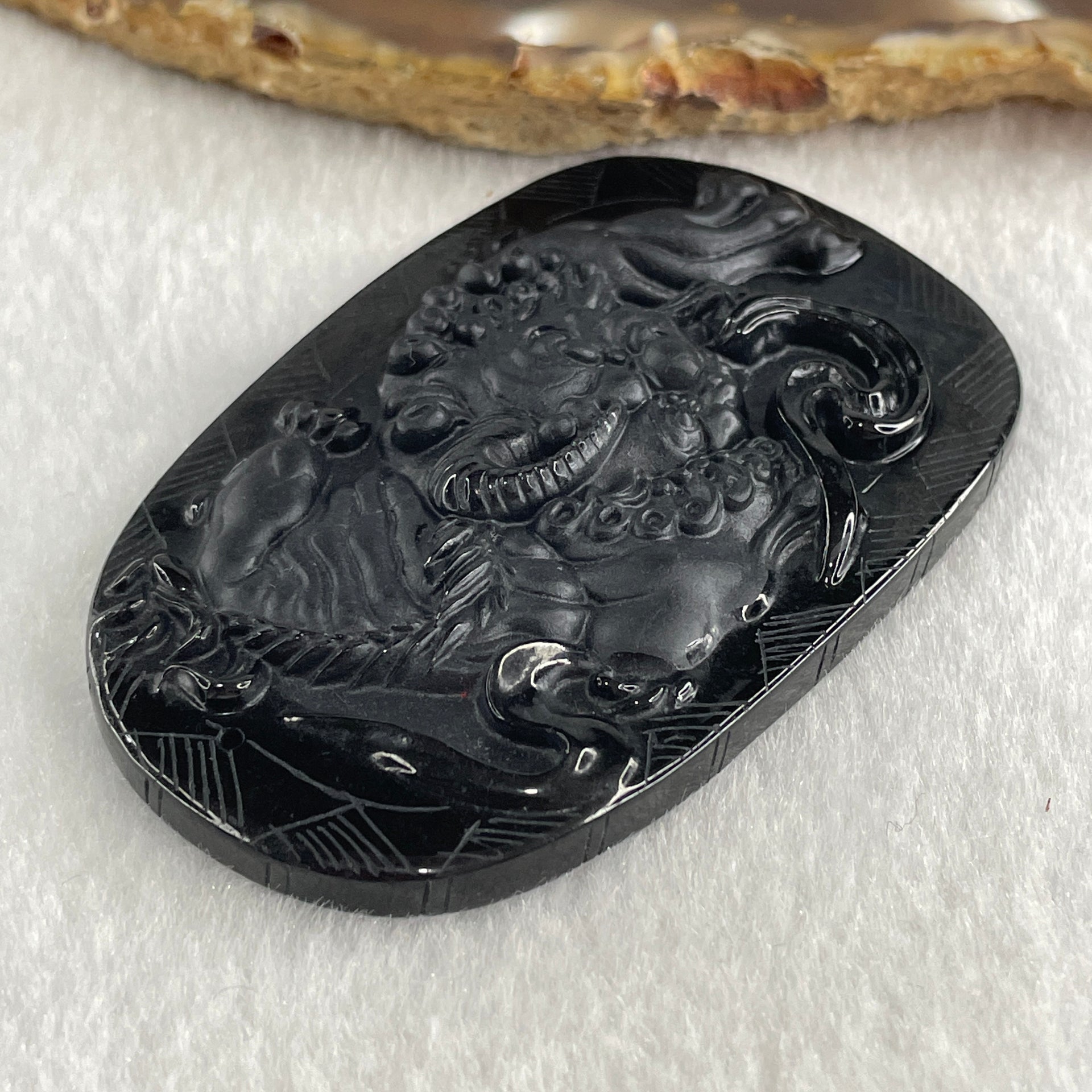 Type A Opaque to Partial Translucent Black Omphacite Jadeite Pixiu Pendant 23.77g 63.4 by 40.9 by 8.3mm - Huangs Jadeite and Jewelry Pte Ltd