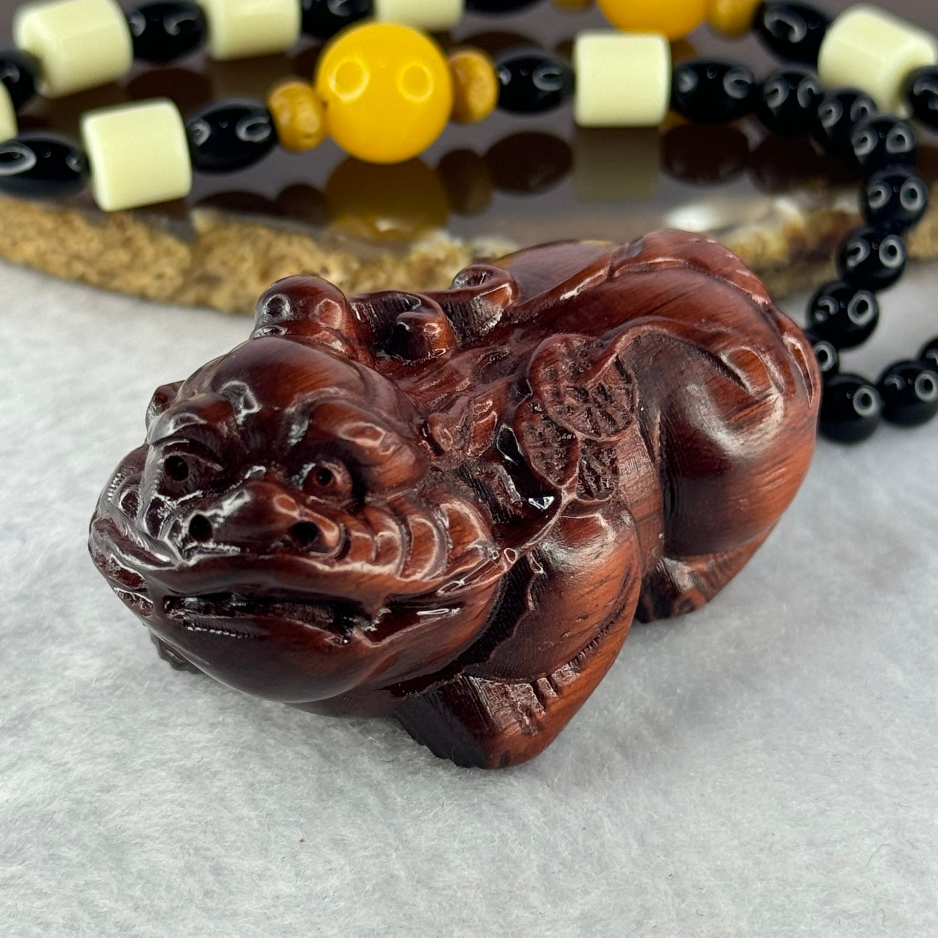 Natural African Rosewood Pixiu Handplay 天然非洲紫檀貔貅手把件 53.34g 60.7 by 35.3 by 36.6mm - Huangs Jadeite and Jewelry Pte Ltd