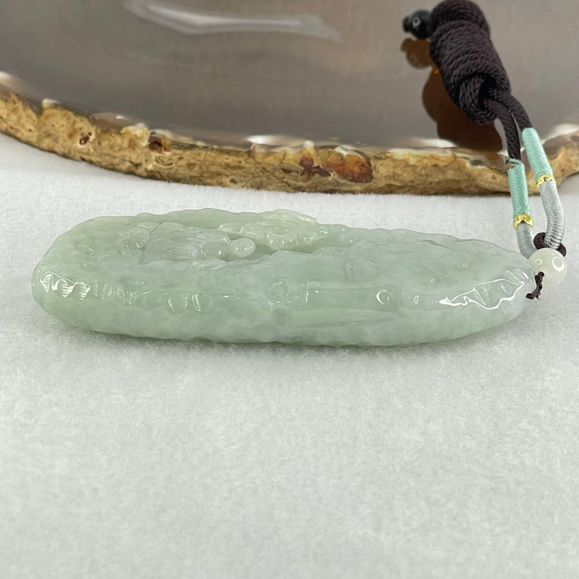 Type A Light Blueish Green Jadeite Seeking Enlightenment with Buddha Pendant 68.18g 78.6 by 32.5 by 12.5mm - Huangs Jadeite and Jewelry Pte Ltd