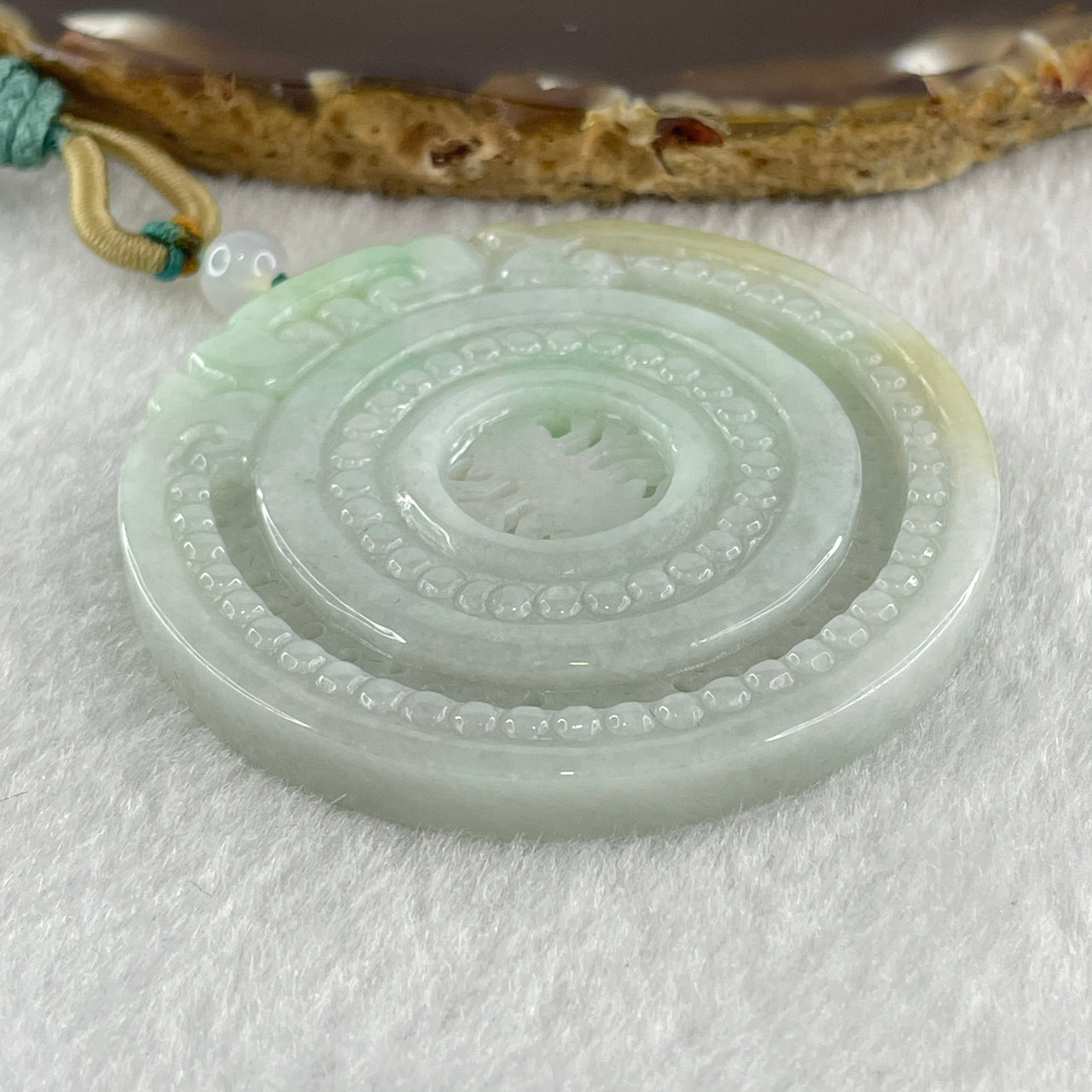 Natural Type A Light Green with Yellow Jadeite Round Pendant 33.87g 53.7 by 5.4mm
