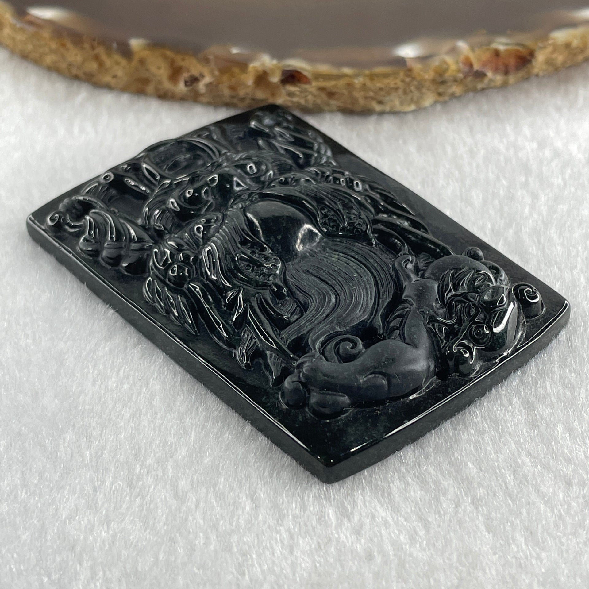 Type A Opaque to Partial Translucent Black Omphacite Jadeite Dragon with pixiu Pendant 45.42g 66.0 by 45.5 by 9.2mm - Huangs Jadeite and Jewelry Pte Ltd