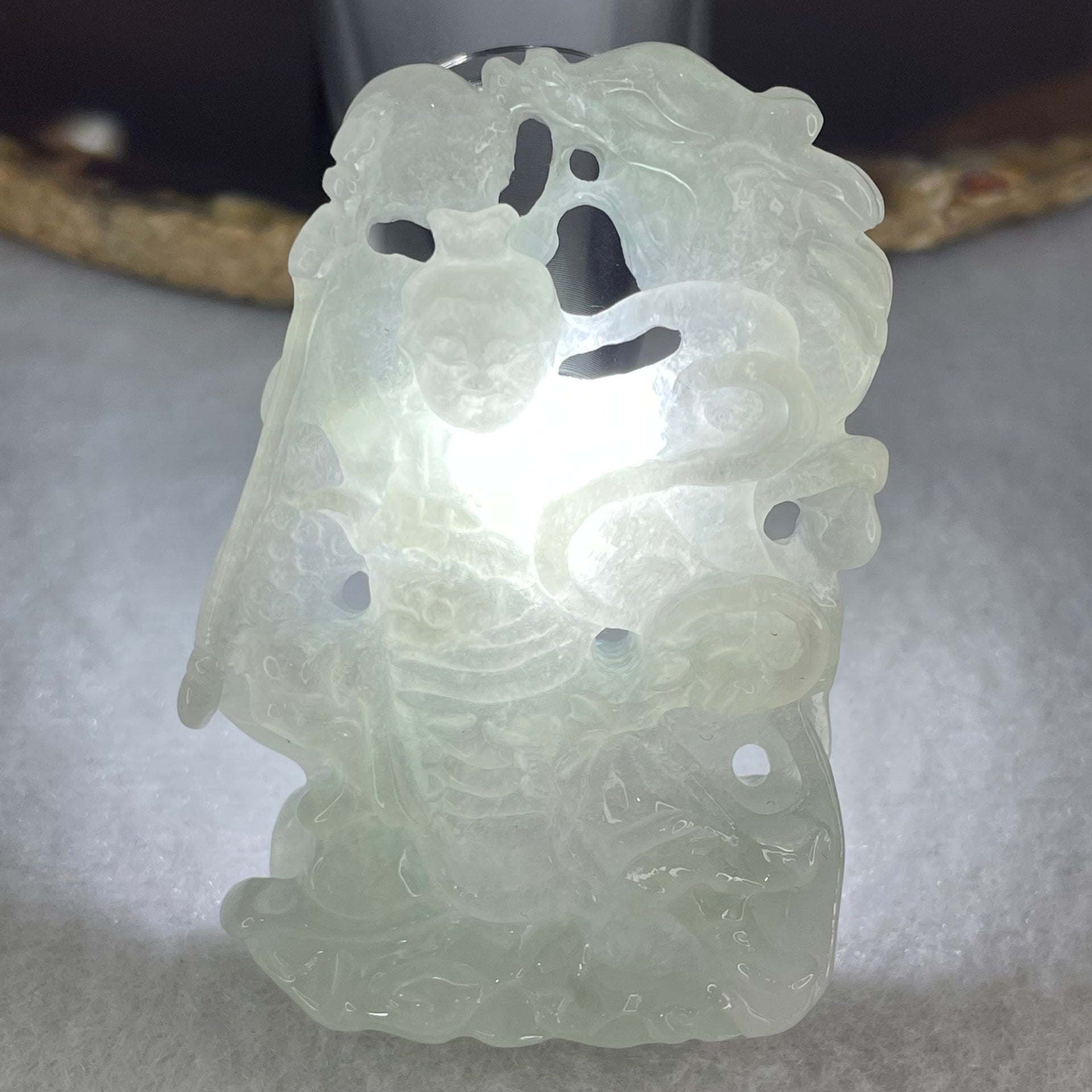 Type A Light Green with Lavender Jadeite Sun Wu Kong with Dragon Pendant 26.42g 52.8 by 36.3 by 36.2mm - Huangs Jadeite and Jewelry Pte Ltd
