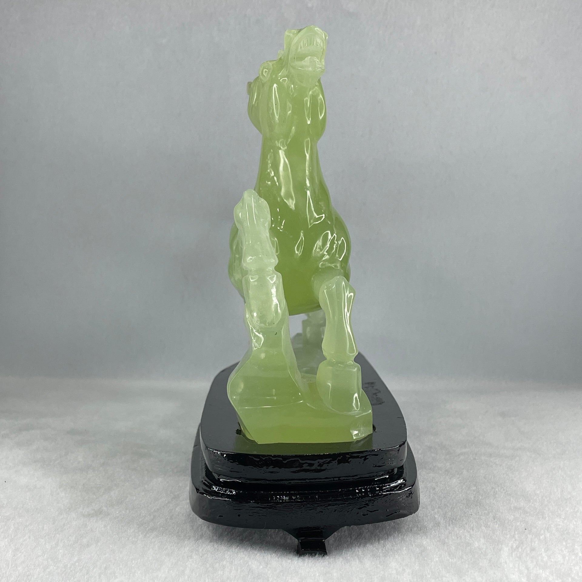Natural Light Green Serpentine Victory Horse with Wooden Stand Display 1,274.6g 255.0 by 90.0 by 183.0mm - Huangs Jadeite and Jewelry Pte Ltd