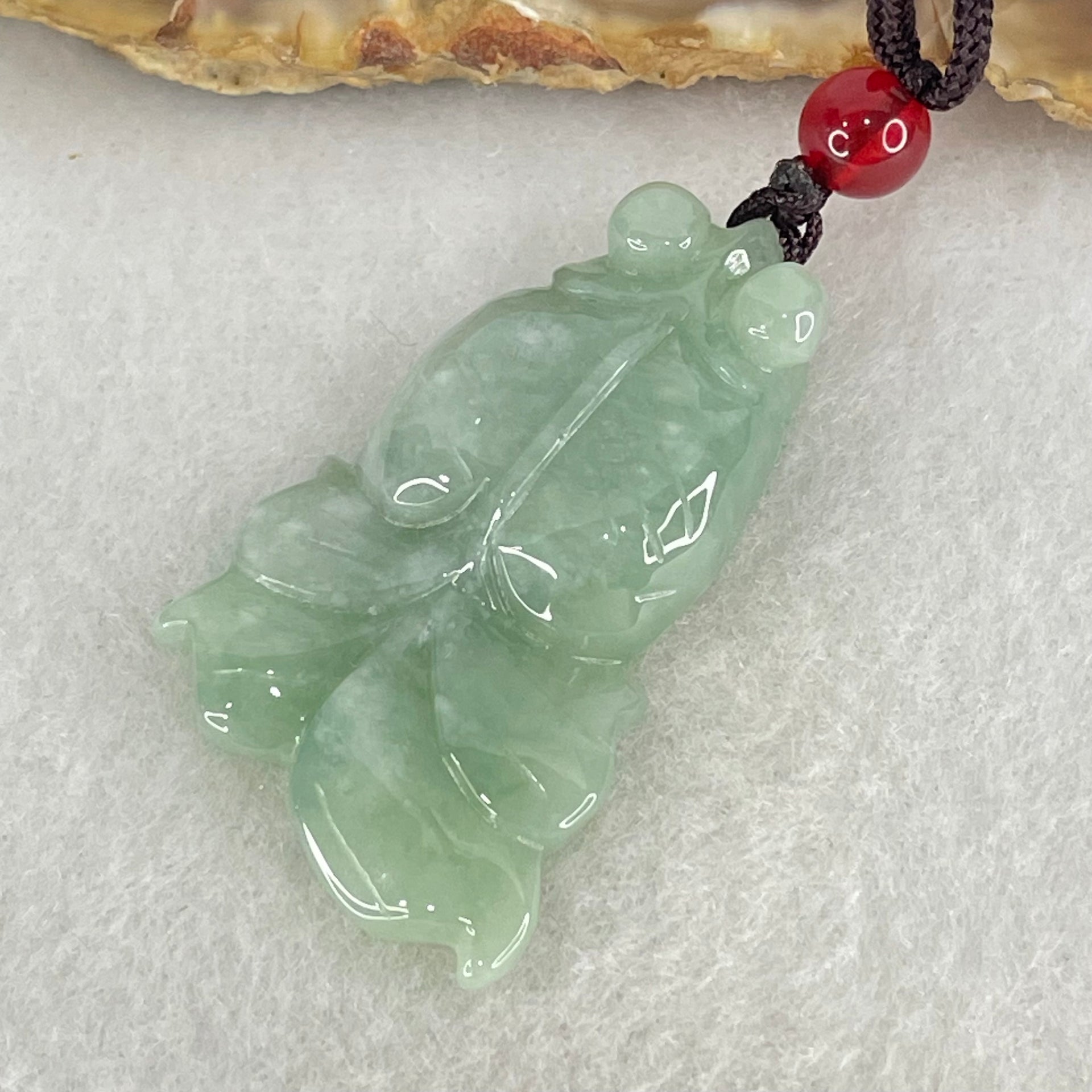 Type A Blueish Green Jadeite Goldfish Pendant 10.23g 37.0 by 22.11 by 7.4mm - Huangs Jadeite and Jewelry Pte Ltd