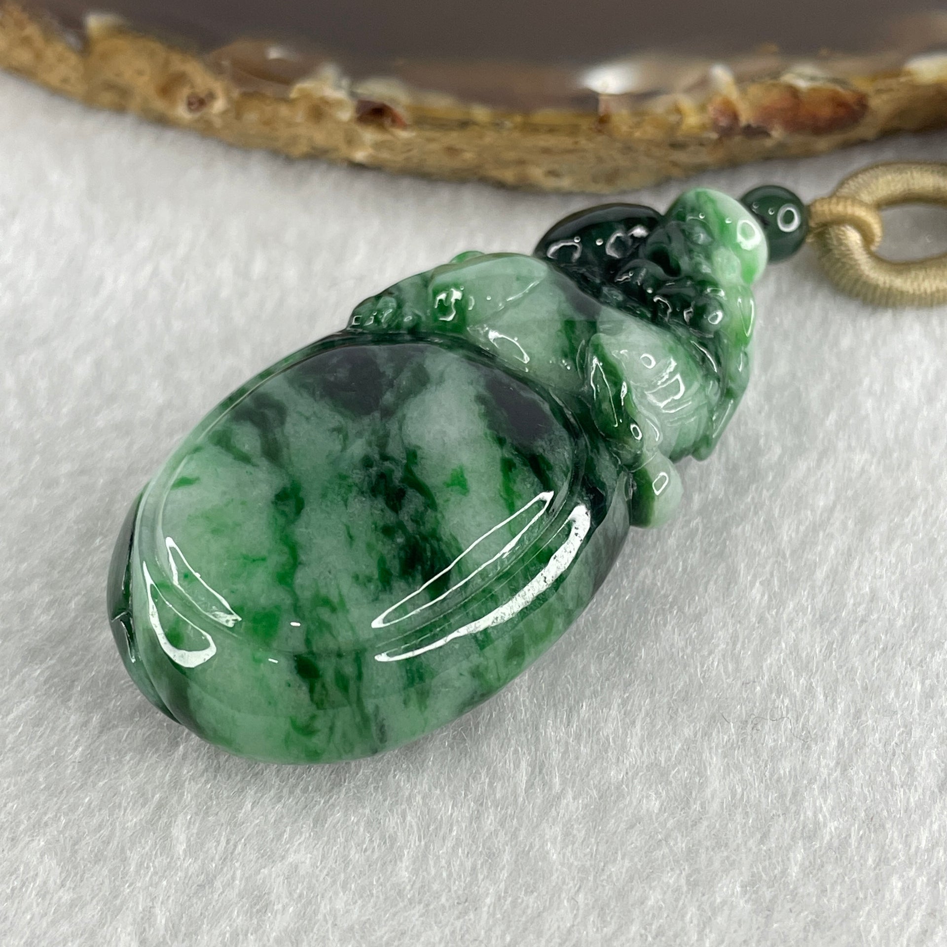 Certified Natural Type A Light Green with Dark Green and Old Mine Spicy Green Pattern Jadeite Pixiu on Money Bag Pendant 46.46g 57.2 by 29.1 by 14.1mm - Huangs Jadeite and Jewelry Pte Ltd