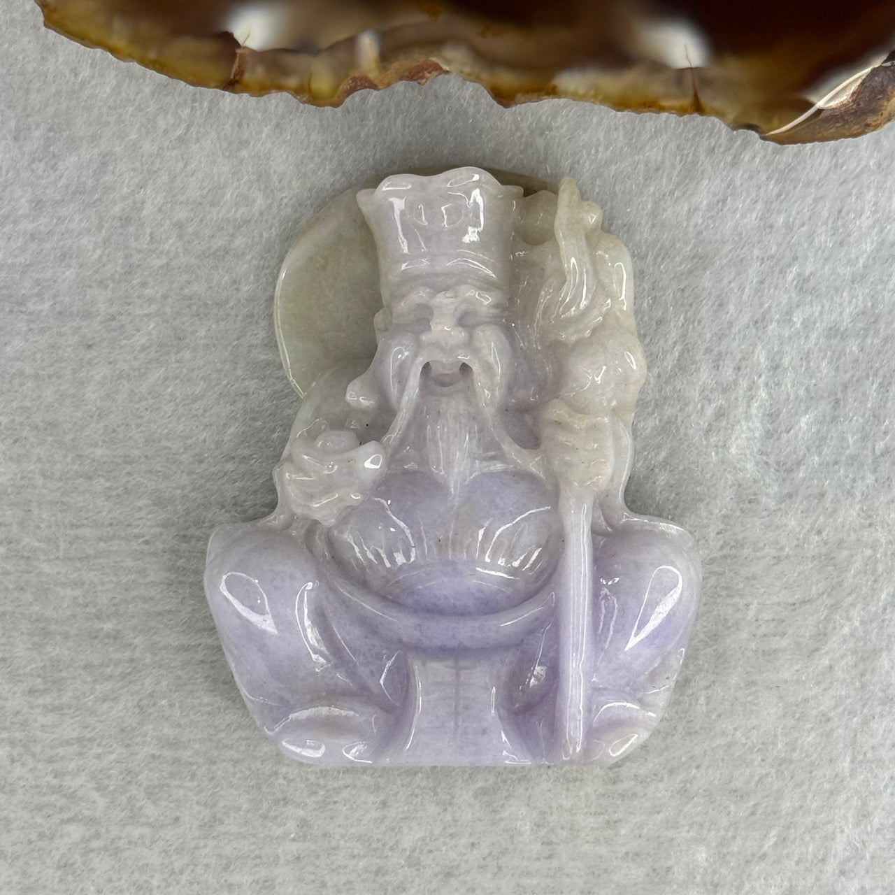 Type A Lavender with Slight Green Jadeite Tu Di Gong 38.27g 48.0 by 39.3 by 11.9mm - Huangs Jadeite and Jewelry Pte Ltd