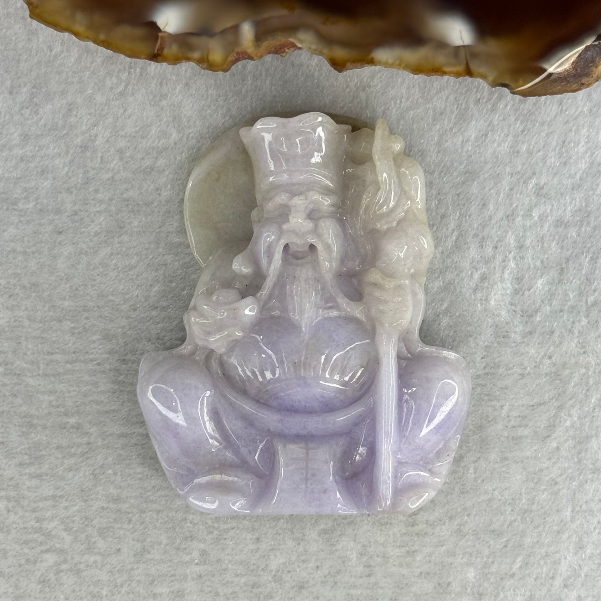 Type A Lavender with Slight Green Jadeite Tu Di Gong 38.27g 48.0 by 39.3 by 11.9mm - Huangs Jadeite and Jewelry Pte Ltd