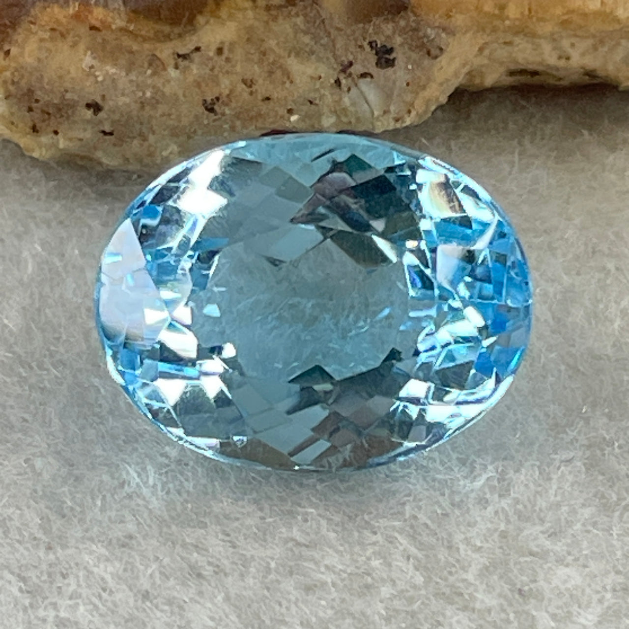 Natural Sky Blue Topaz Oval Shape 11.63ct 14.5 by 11.3 by 8.4mm - Huangs Jadeite and Jewelry Pte Ltd