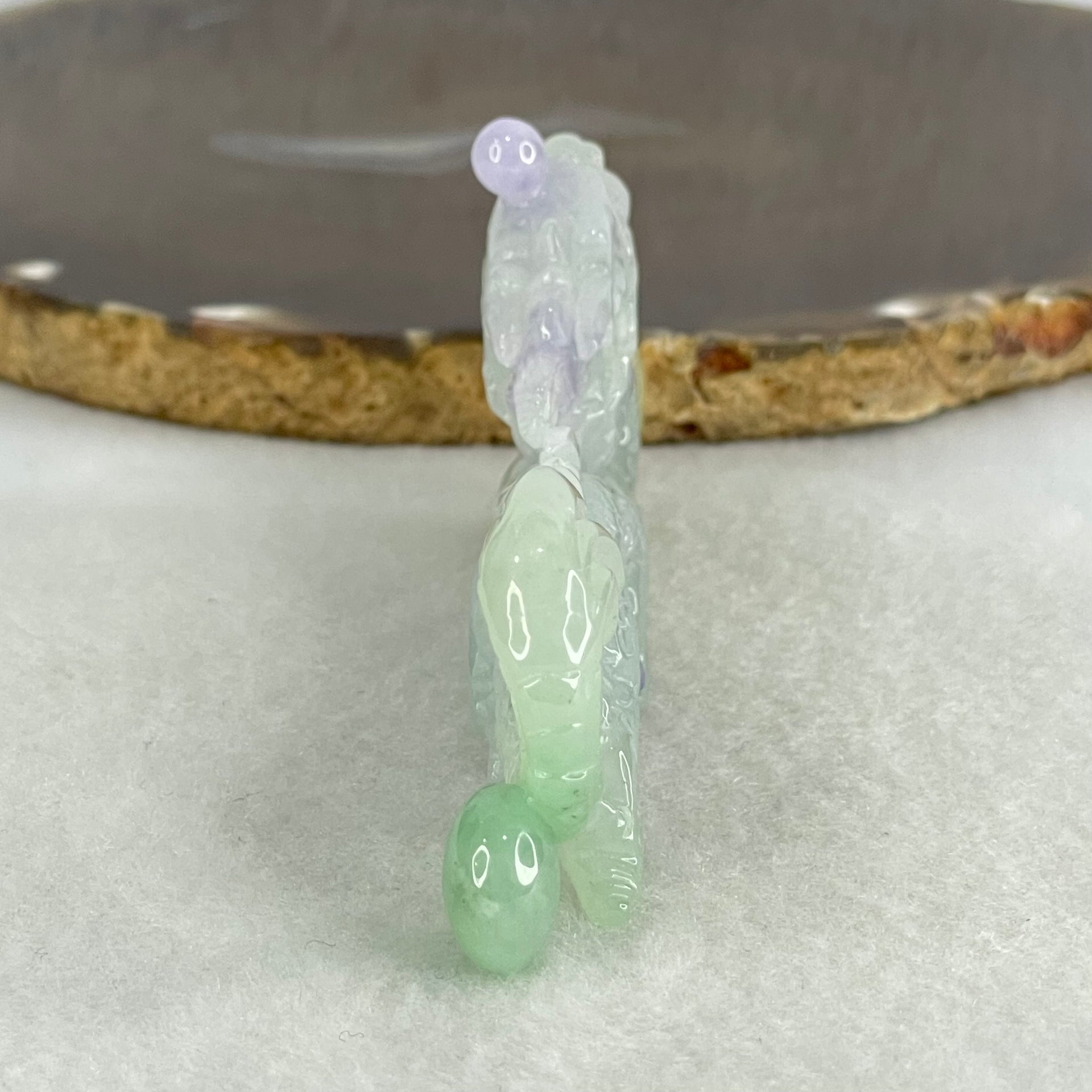 Type A Light Green with Deep Bright Lavender and Yellow Jadeite Pendant 45.66g 8.3 by 3.9 by 11mm with Wooden Stand - Huangs Jadeite and Jewelry Pte Ltd