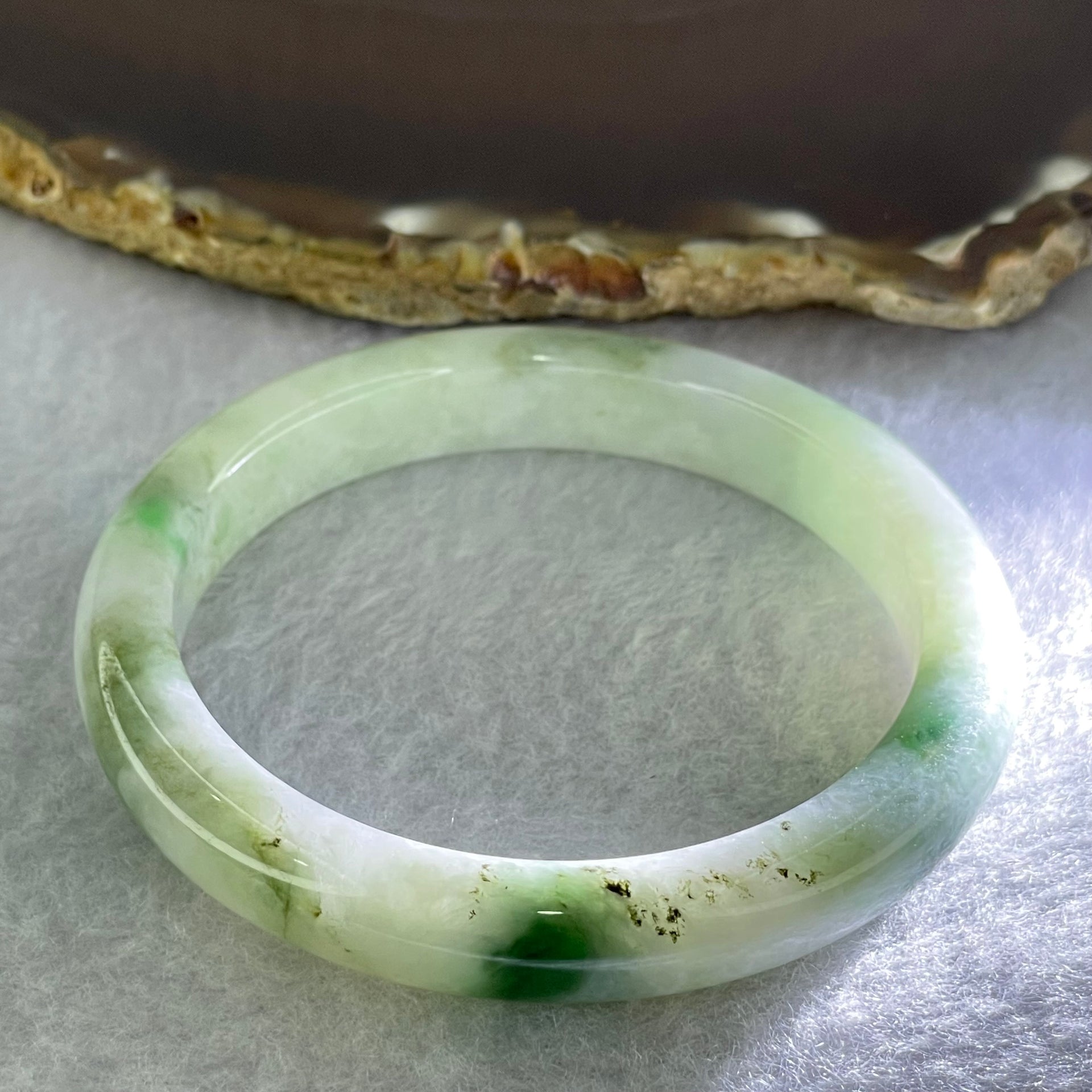 Type A Light Green with Moss Green Piao Hua Jadeite Bangle Internal Diameter 55.6mm 41.97g 10.4 by 7.6mm ( Very Slight External Rough + Internal Lines) - Huangs Jadeite and Jewelry Pte Ltd