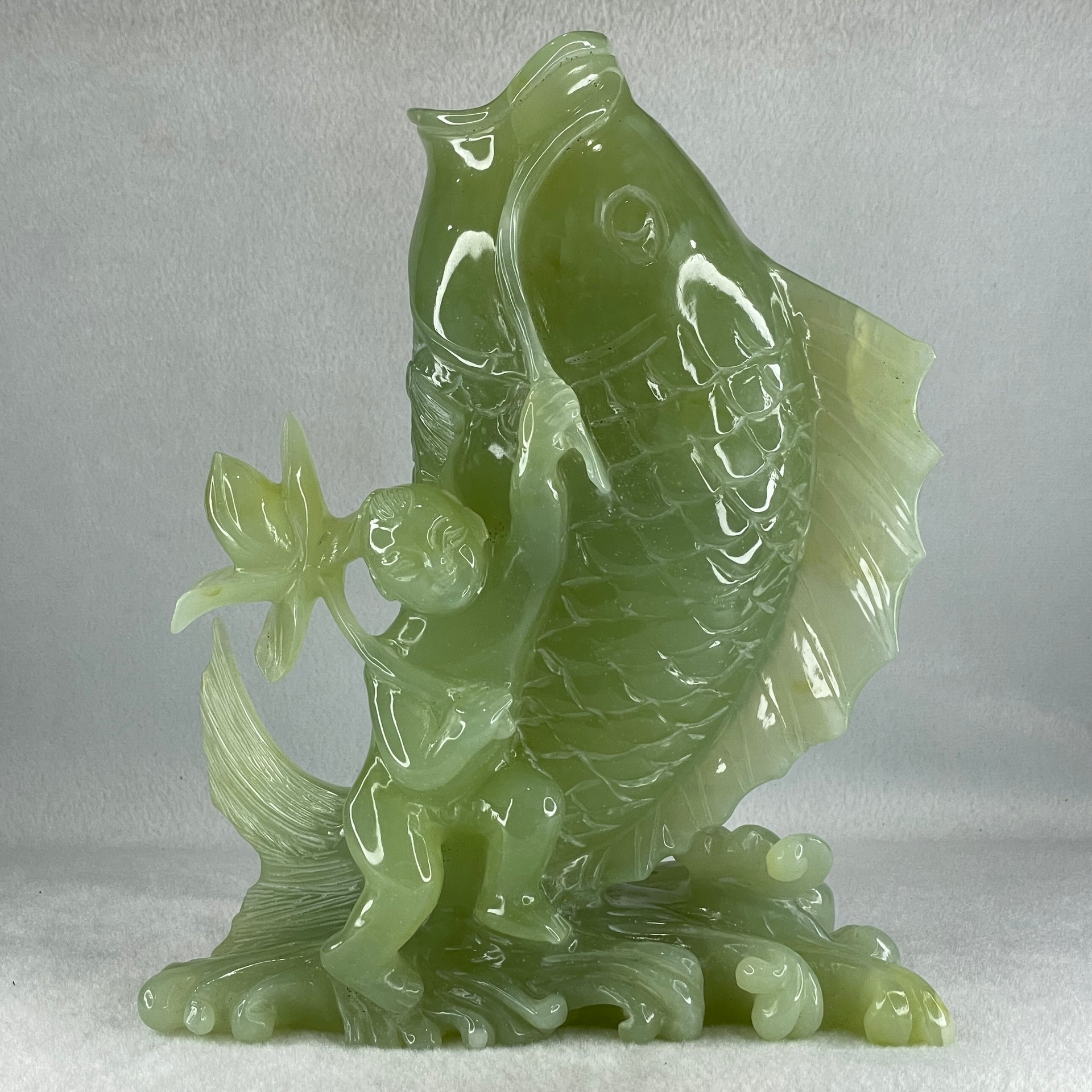 Natural Green Serpentine Carp Fish with Gui ren and Lotus with Wooden Stand Display 2277.9g 215.0 by 120.0 by 250.0mm - Huangs Jadeite and Jewelry Pte Ltd