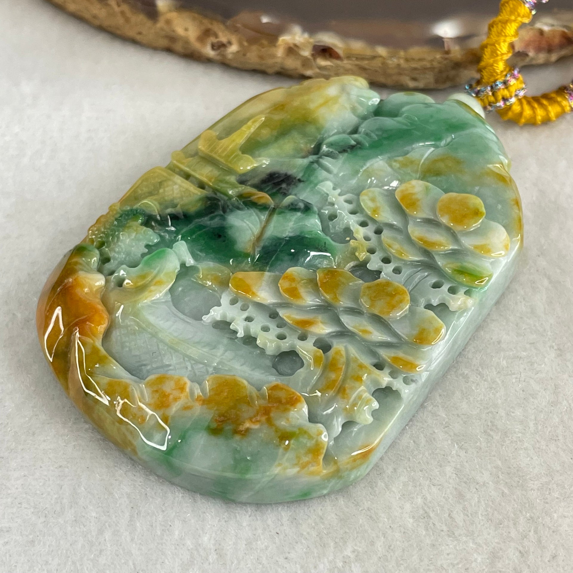 Type A Brown Blueish Green with Yellow Jadeite Shan Shui with Guiren Benefactor Pendant 93.95g 66.8 by 49.0 by 13.8mm - Huangs Jadeite and Jewelry Pte Ltd