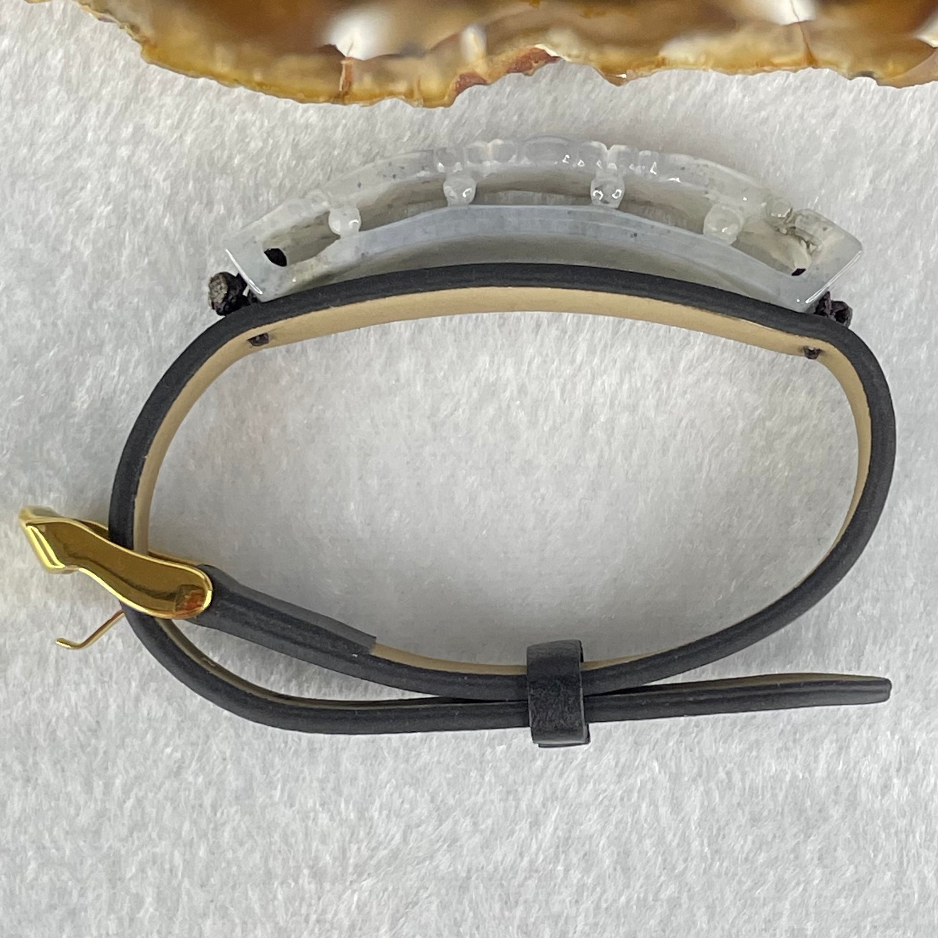 Type A Semi Icy Grey Jadeite Phoenix with PVC Bracelet 11.86g 49.3 by 11.1 by 7.7mm - Huangs Jadeite and Jewelry Pte Ltd