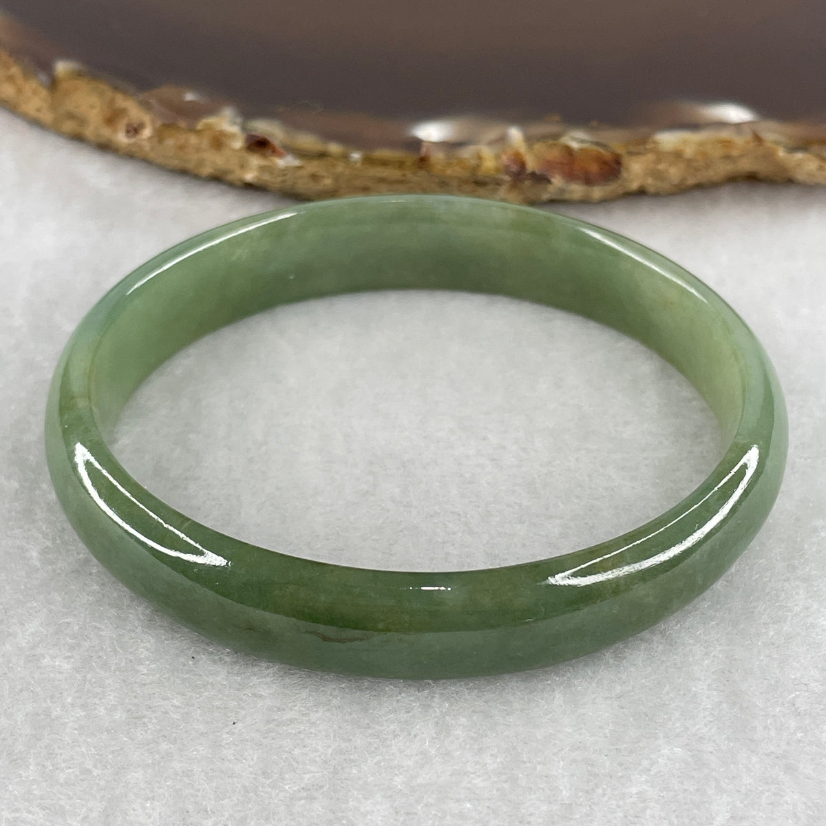 Natural Type A Green & Brownish Jadeite Oval Bangle | 55.8mm Gui Yuan Fit (27.89g 11.0x5.5mm | Very Very Slight External Line | Ergonomic Grace, Grounding & Heart Harmony)