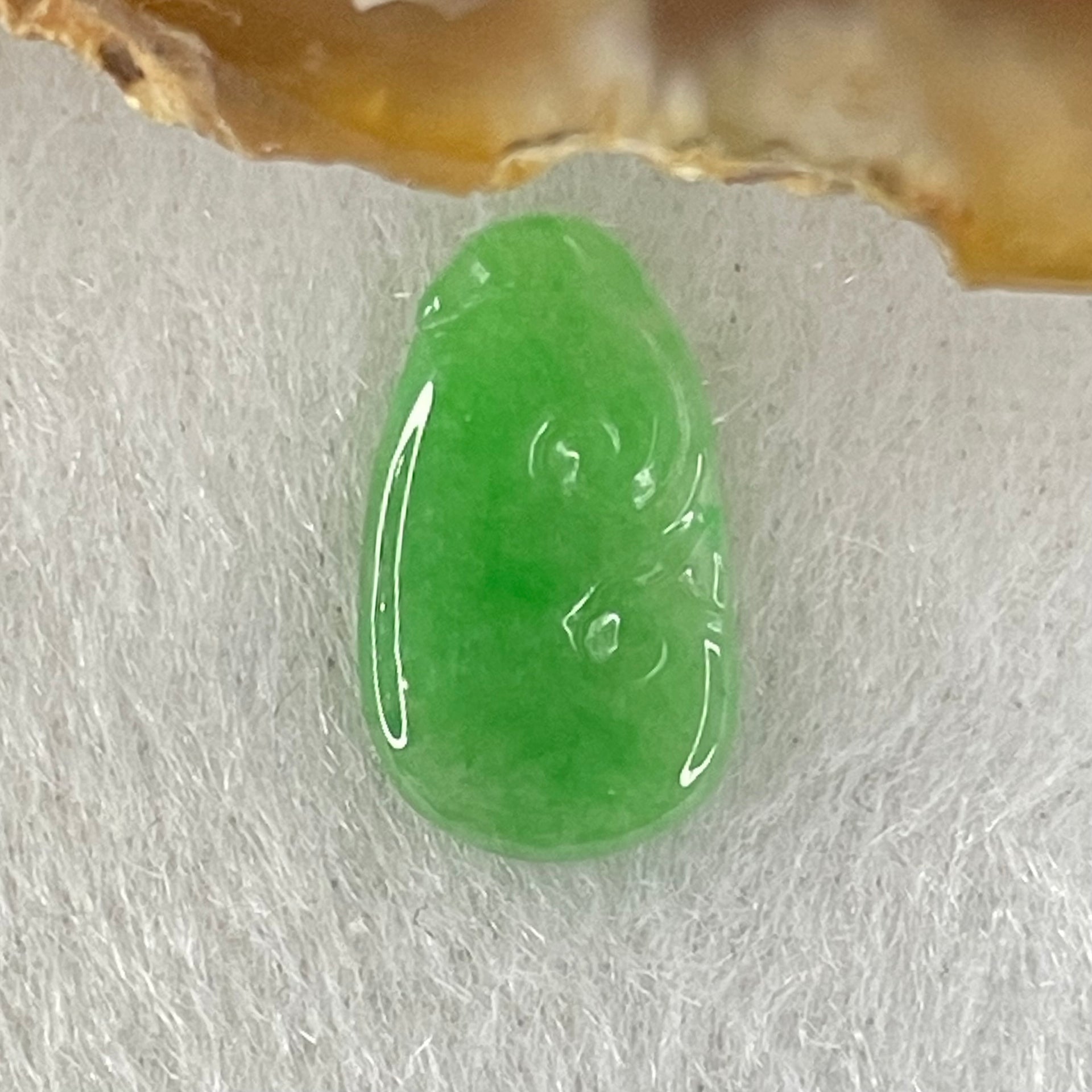 Type A Old Mine Spicy Green Jadeite Ruyi Charm Stone For Setting 0.36g 14.1 by 8.3mm by 1.4mm - Huangs Jadeite and Jewelry Pte Ltd