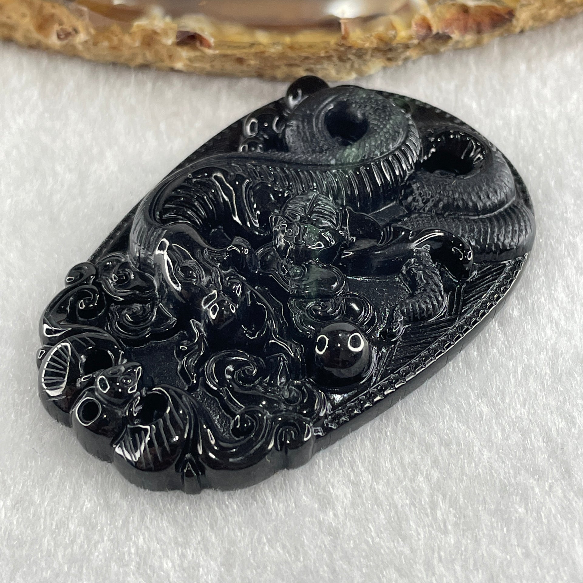 Type A Opaque to Partial Translucent Black Omphacite Jadeite Snake Pendant 24.70g 59.7 by 40.1 by 8.5mm - Huangs Jadeite and Jewelry Pte Ltd