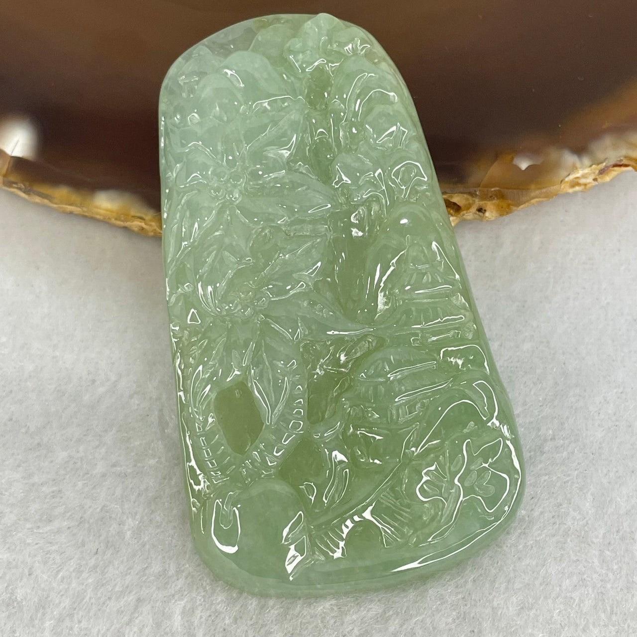 Type A Semi Icy Light Green Jadeite Shan Shui Gui Ren Benefactor and Flower Pendant 34.95g 58.8 by 33.9 by 8.8mm - Huangs Jadeite and Jewelry Pte Ltd