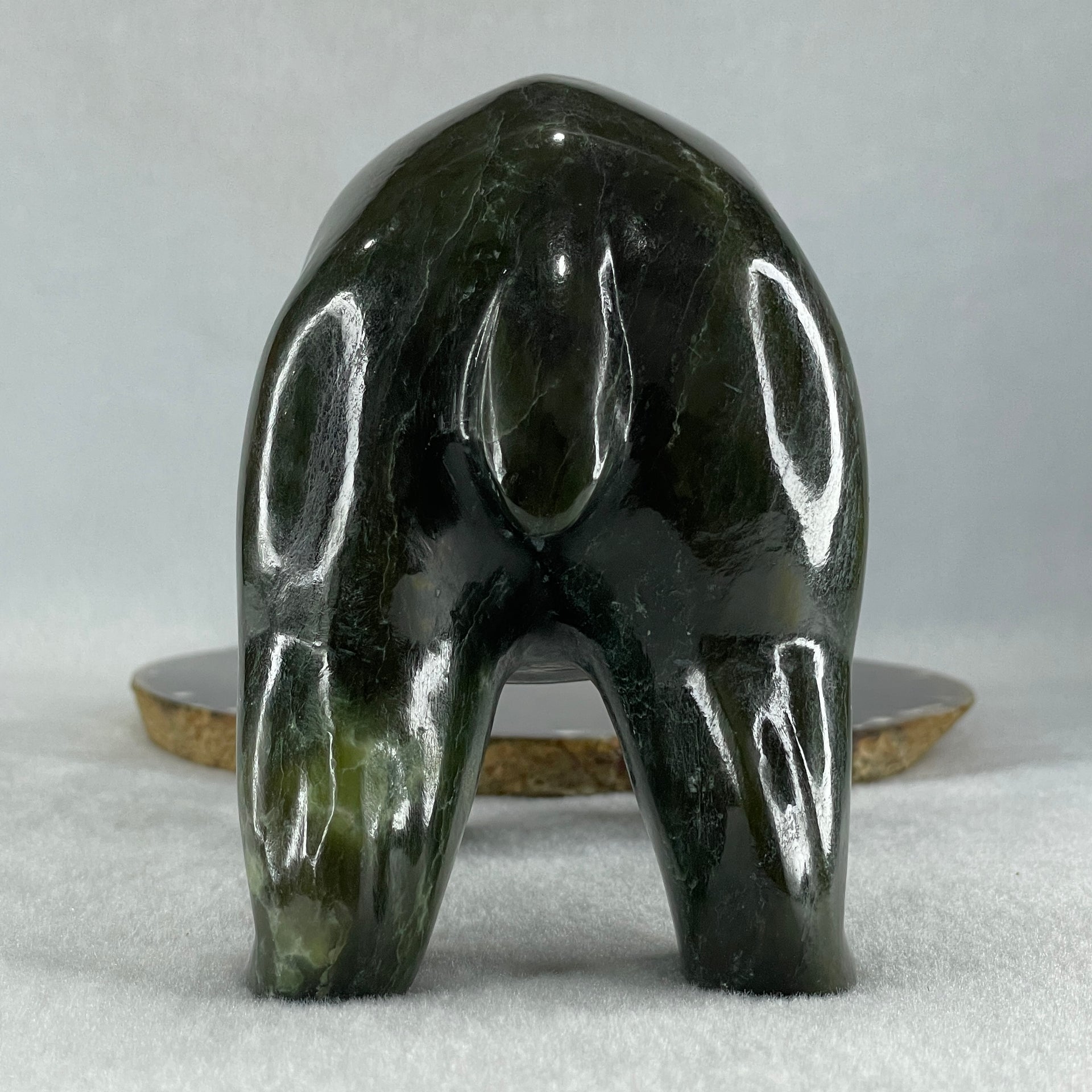 Natural Dark Green Serpentine Bear eating Fish Display 1,800.0g 180.5 by 82.0 by 107.0mm - Huangs Jadeite and Jewelry Pte Ltd